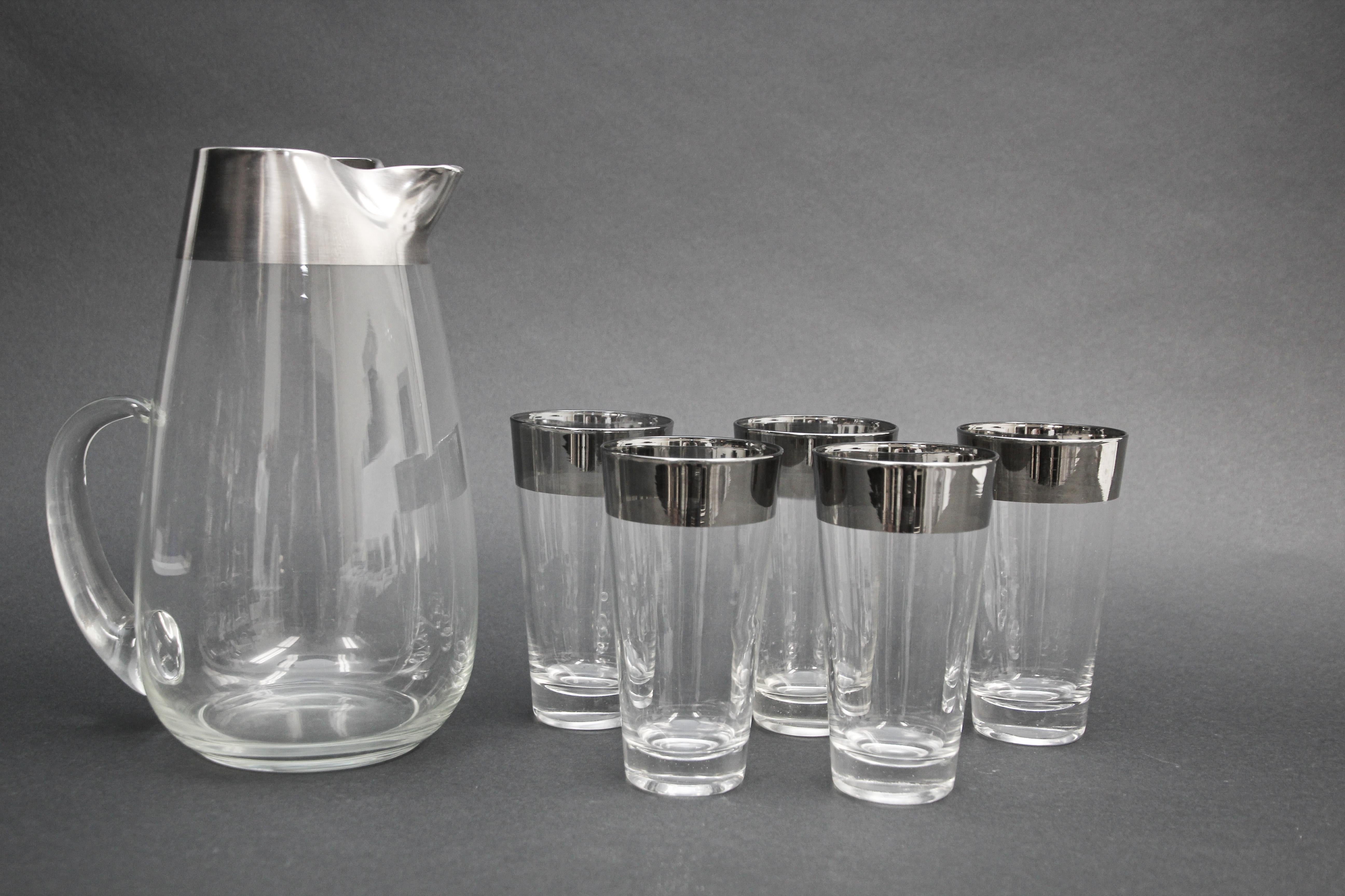 1960s Dorothy Thorpe midcentury barware set of 5 glasses and pitcher.
Elegant exquisite vintage 1950s Designer Dorothy Thorpe pure silver overlay band barware glasses and pitcher
This rare set Dorothy Thorpe midcentury cocktail glasses barware has