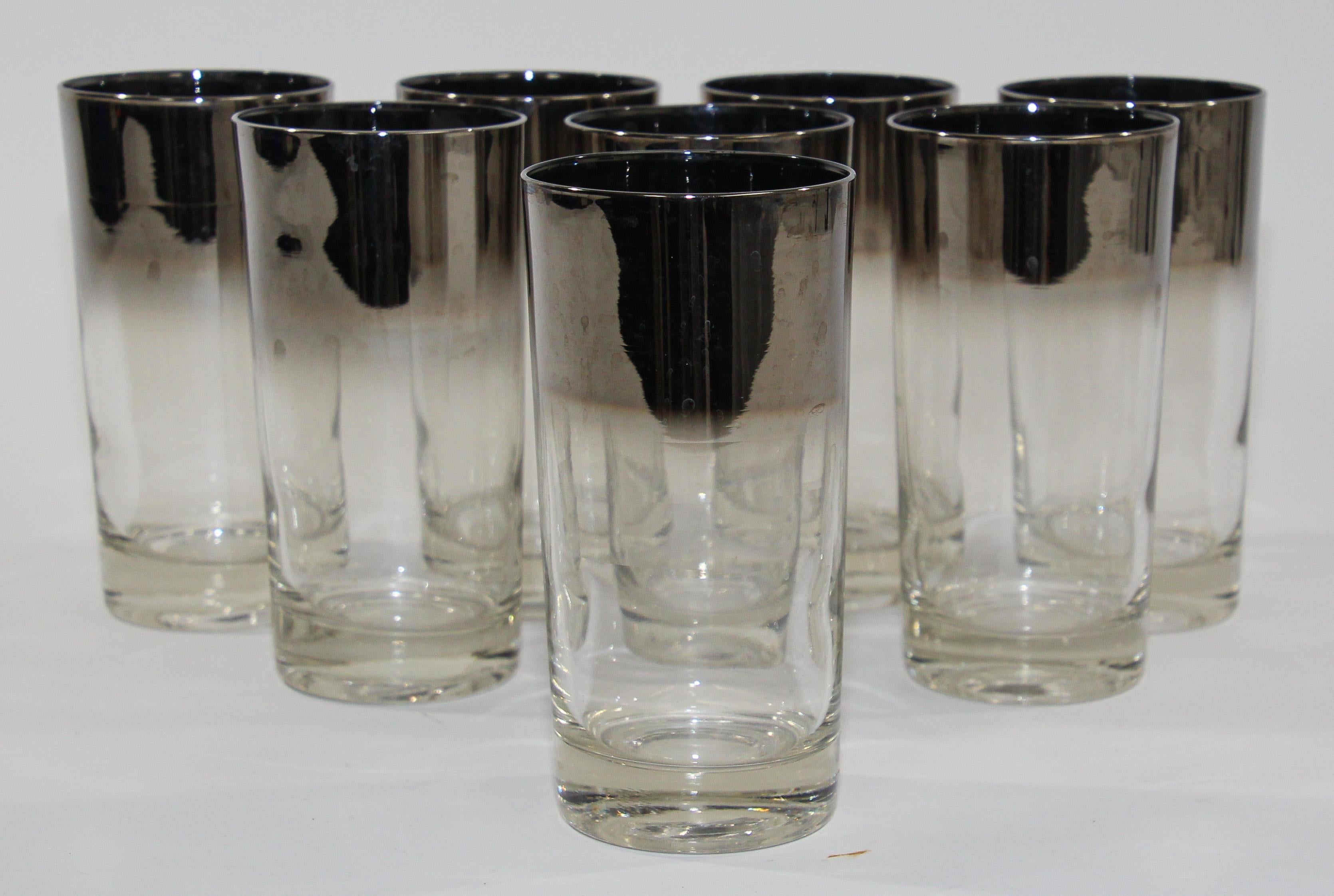 1960s Dorothy Thorpe style midcentury cocktail bar set of 8 pieces
Elegant exquisite vintage 1950s Dorothy Thorpe style pure silver overlay band barware glasses.
This vintage midcentury cocktail glasses barware has the pure silver faded band around