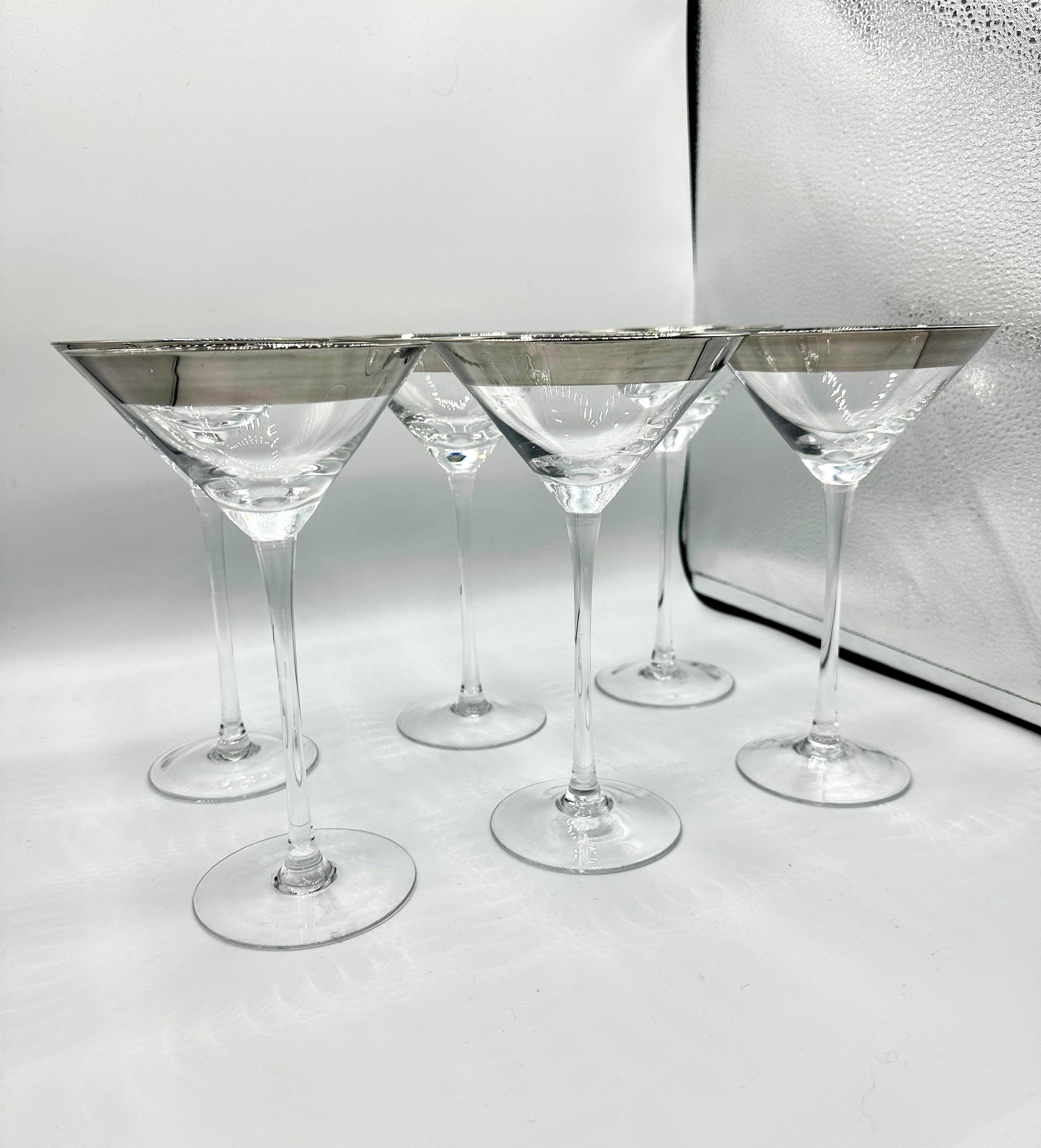 Stunning Set of 6 Dorothy Thorpe Platinum Rimmed Martini Glasses! Perfect for entertaining, these mid-century modernism style glasses are crafted from high-quality glass and feature a beautiful platinum thick band rim. These vintage glasses were