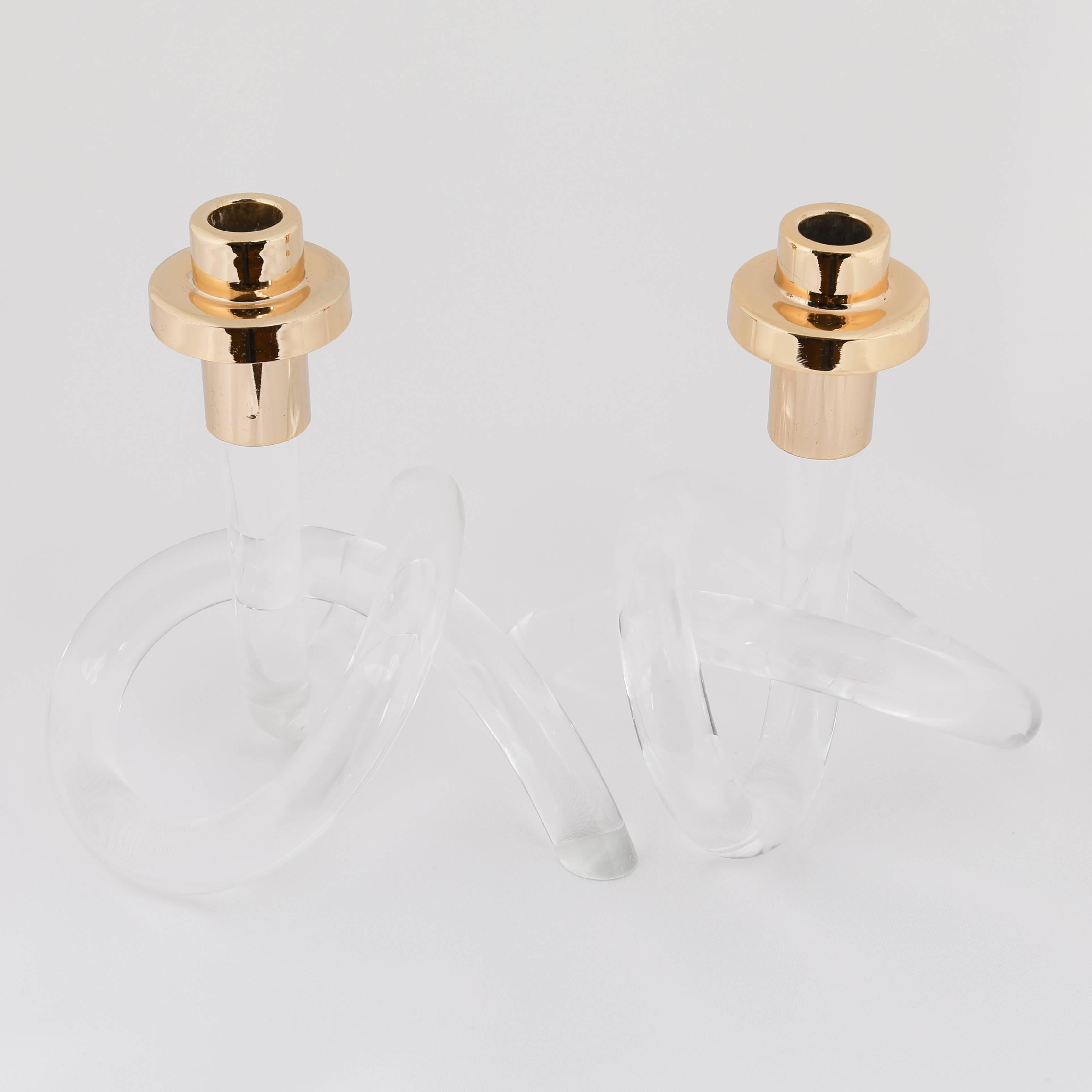 Iconic pair of knotted acrylic and gold plate candleholders by Dorothy Thorpe, circa 1950s. 

 