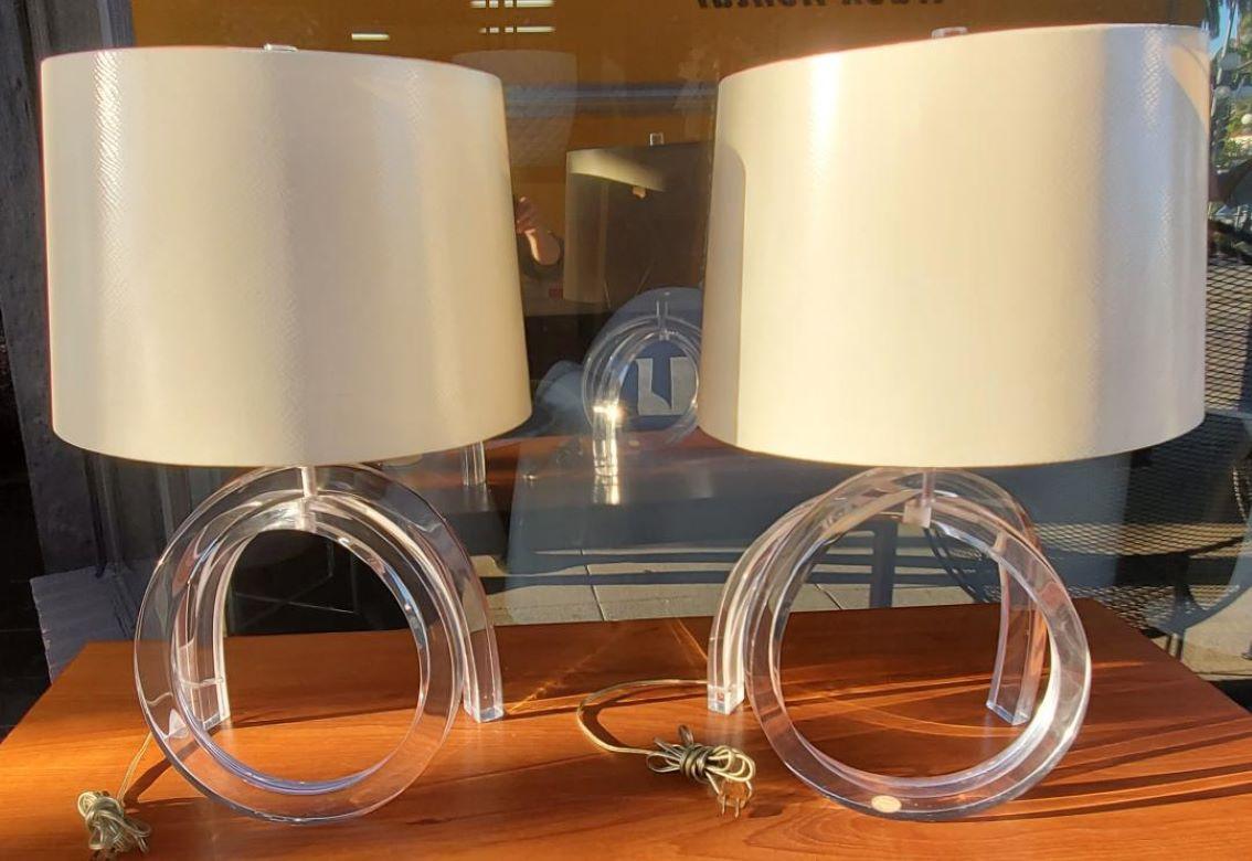 Mid 1960s pair of Dorothy Thorpe pretzel Lucite table lamps with ASTROLITE PRODUCTS RITTS CO Of Los Angles, CA. Label.

These beautiful Dorothy Thorpe twisted Pretzel table lamps Are all original and we have owned them for over 40 years.

These