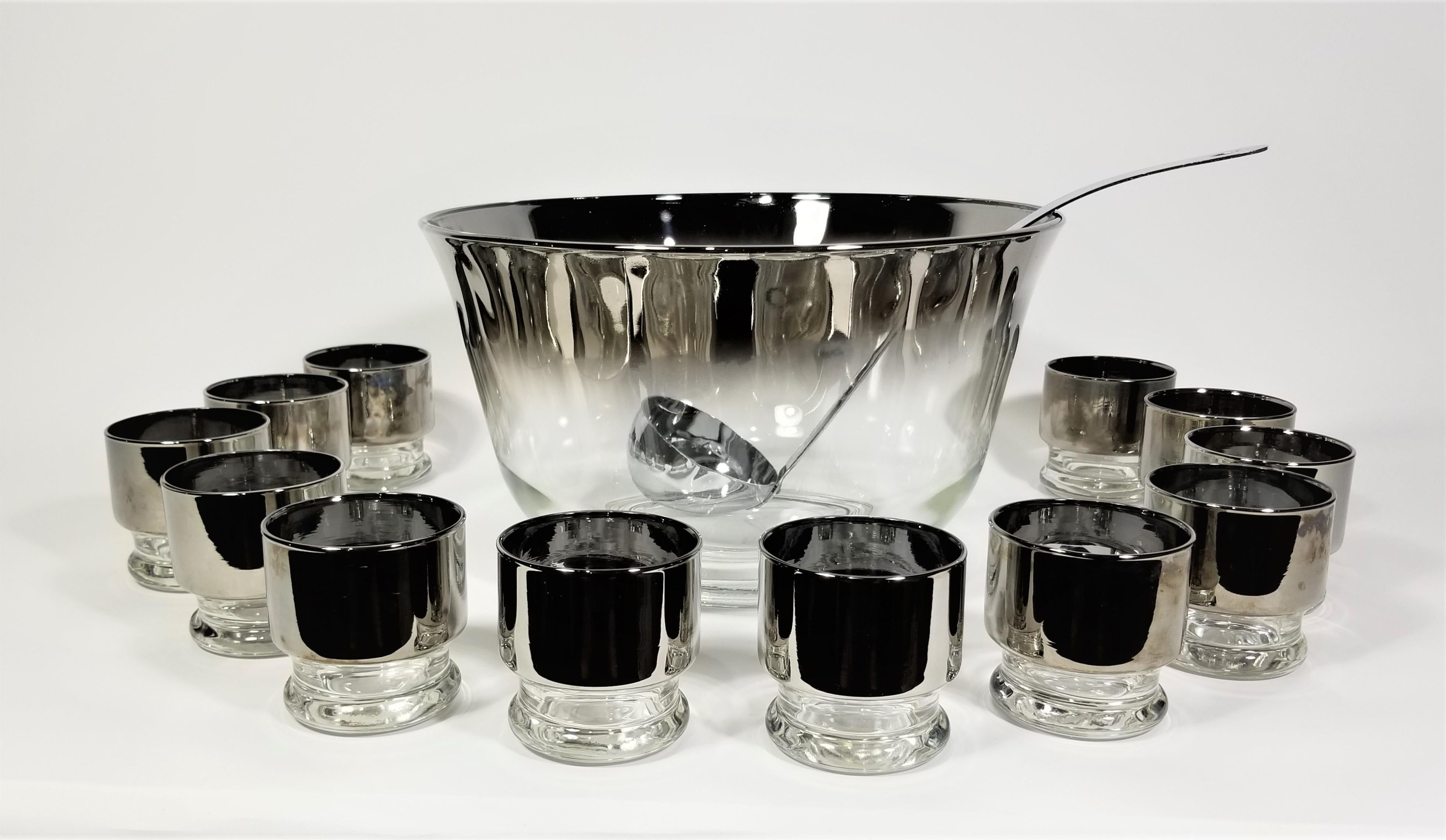 1960s Mid century dorothy thorpe glassware barware. Punch bowl set. 14 pieces. Includes punch bowl. 12 glasses. Ladle and holder / carrier. 

*Please see photos. Set is in Excellent condition with exception of exhibiting some wear or slight