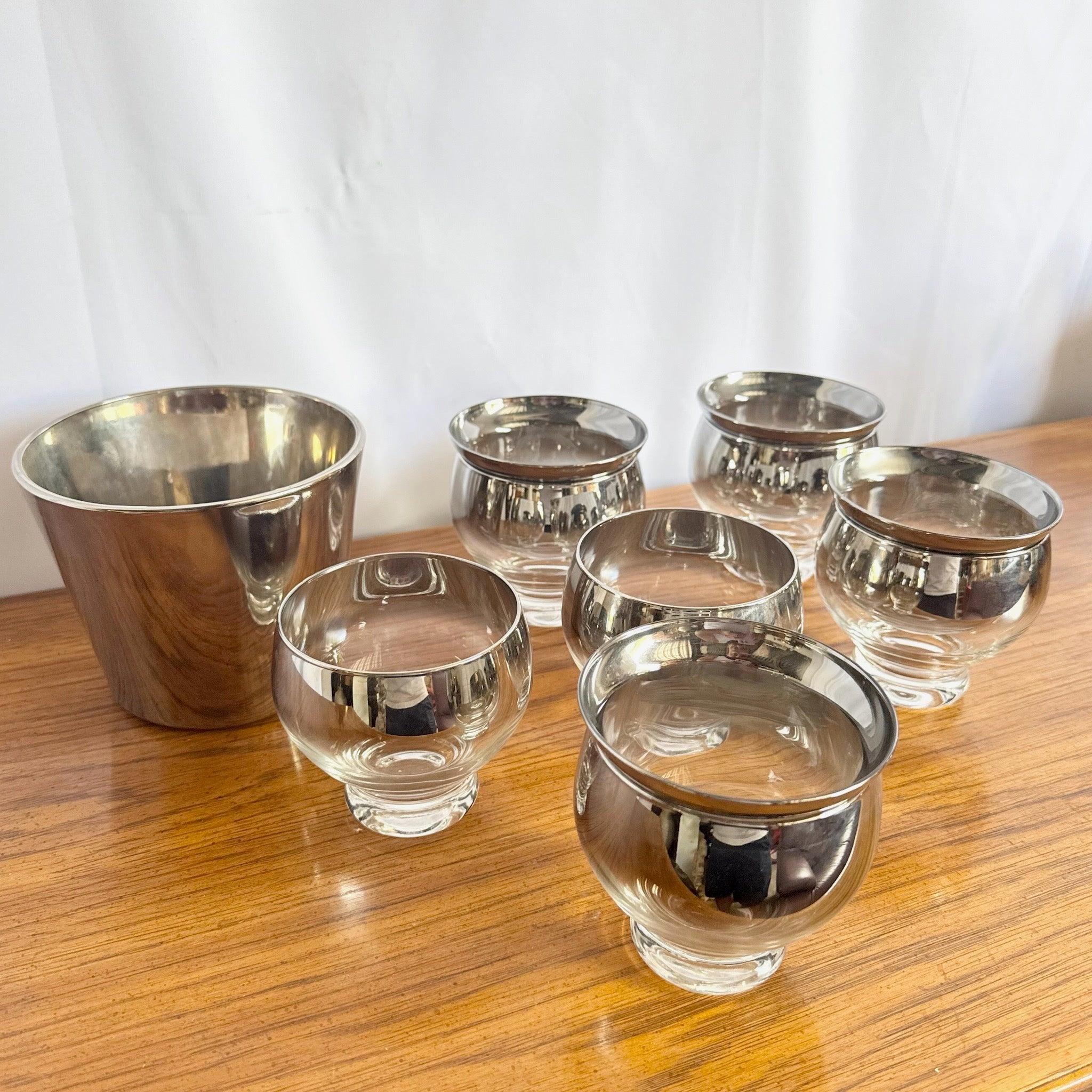 Mid Century Silver Fade Nesting Glasses—11-piece Dorothy Thorpe set with metallic ombré bowls and glasses, perfect for elegant entertaining and vintage flair.
 

 We sell items as acquired, without restoring or repairing. Vintage pieces may have