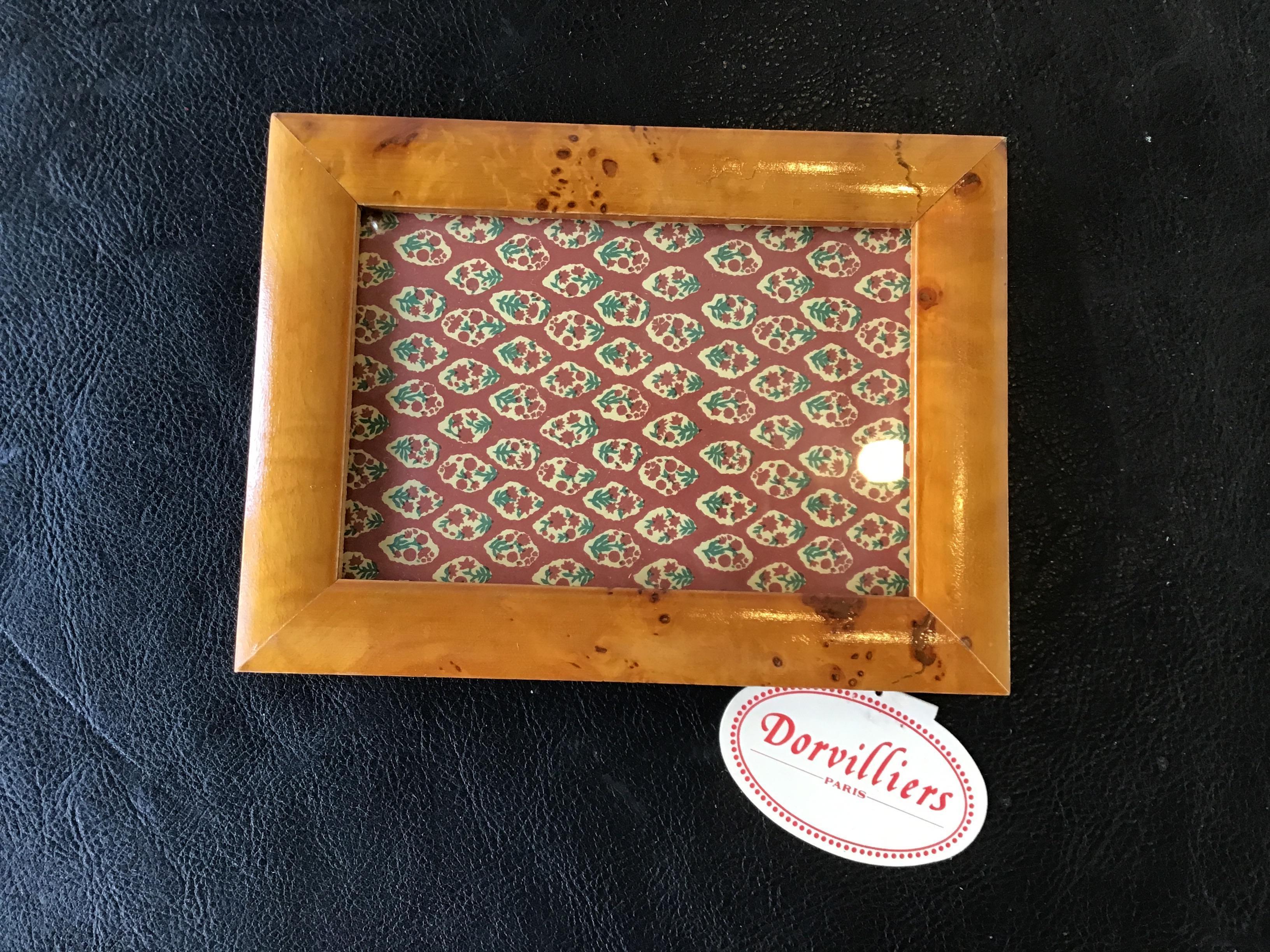 Dorvilliers burl wood picture frames. Made in France.  There are only 4 small frames available.


