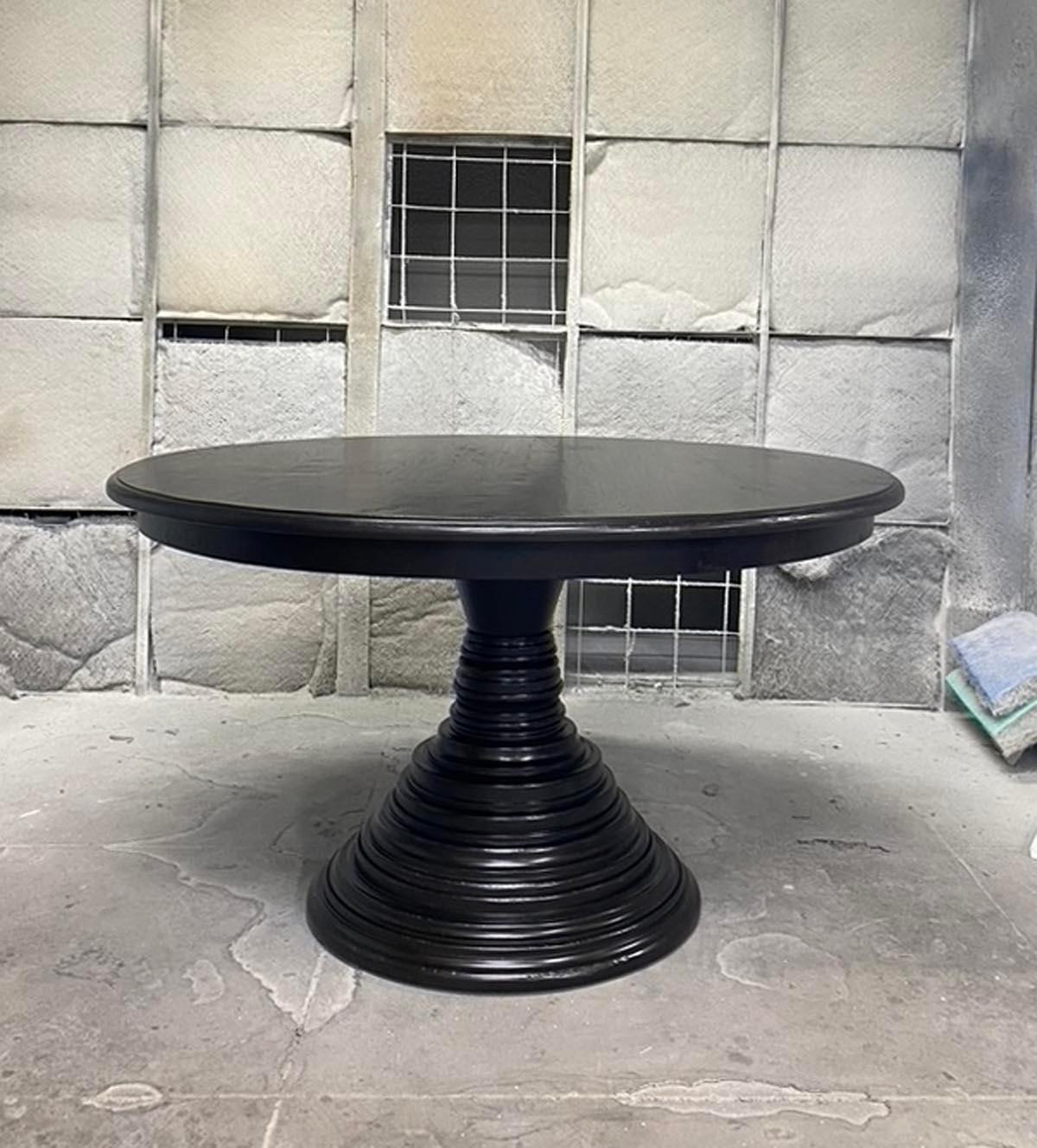 Dos Gallos custom beehive pedestal table shown here in walnut with a light distress and ebony finish. This table can be made in any size and finish and can be used as a dining table or center table, we even make them as small as side tables.
All Dos