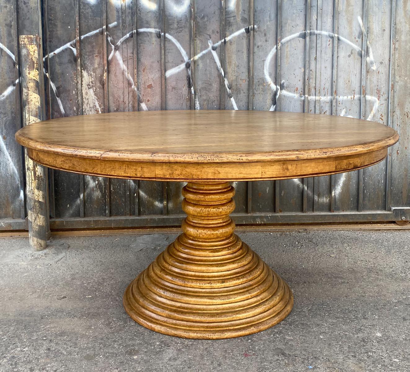 This is Dos Gallos' custom Beehive Pedestal Table as shown in solid walnut with a custom (per designer) finish. Heavy distress with cracked boards, and a light color walnut with a high sheen finish. As shown 60Dx30H, but can be made in custom