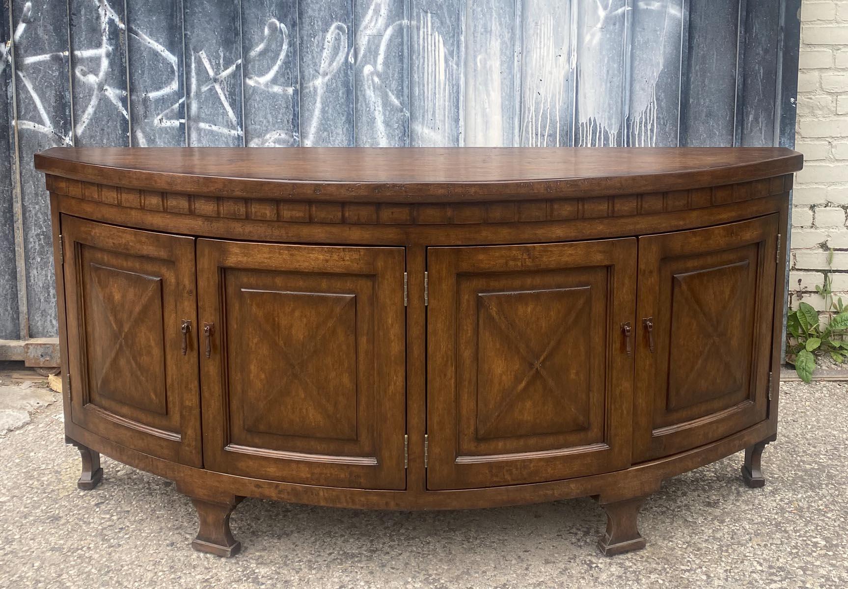 This is our custom Demi Lune cabinet. As shown20150 in walnut, with a custom, medium distressed finish. Can be made in any size and finish. All our custom pieces are bench made and hand finished in Los Angeles,
Please inquiry for pricing as it is