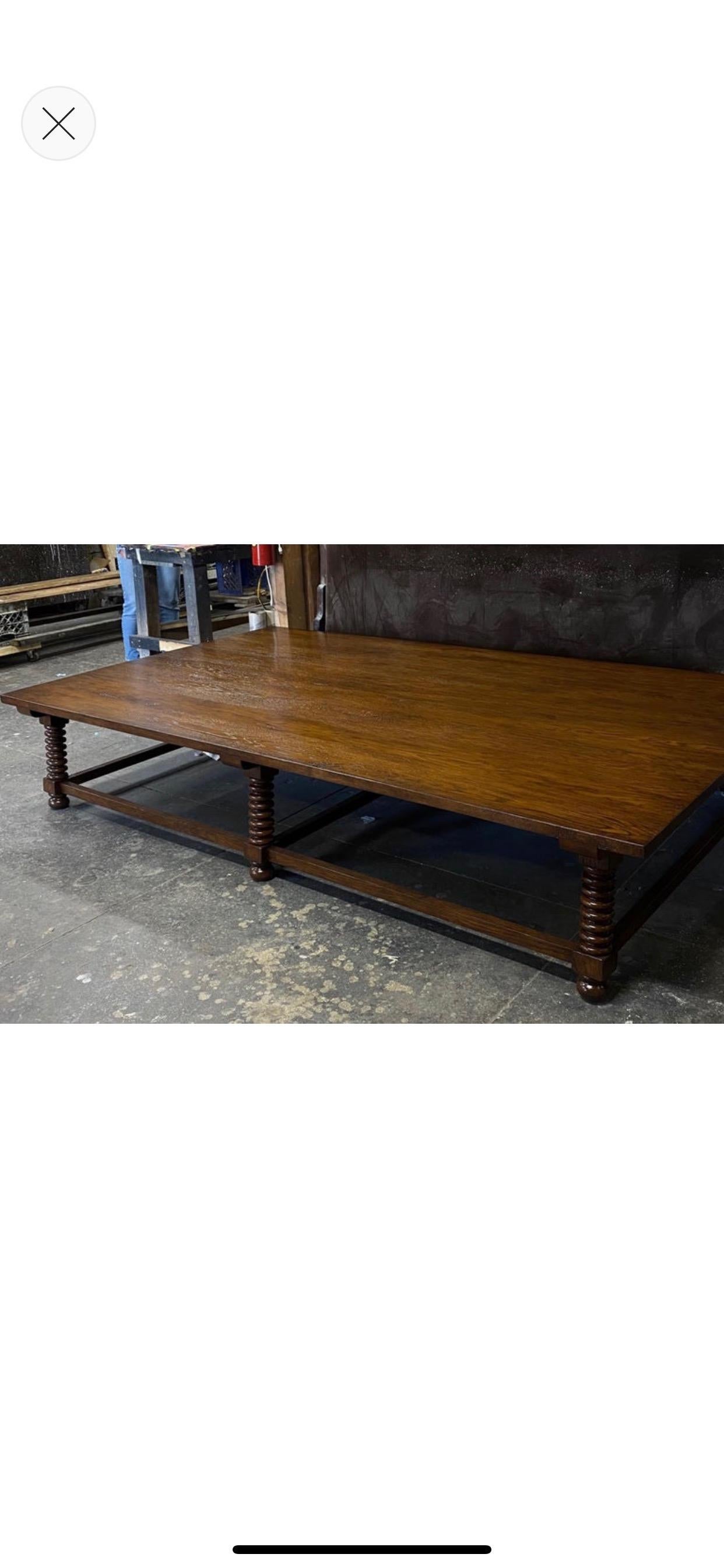This is a Dos Gallos custom coffee table that can be made in and Size and finish. Shown here in Oak with hand planed top and medium to heavy distress in client's custom color. All custom pieces are made in Los Angeles. Please inquiry for pricing.