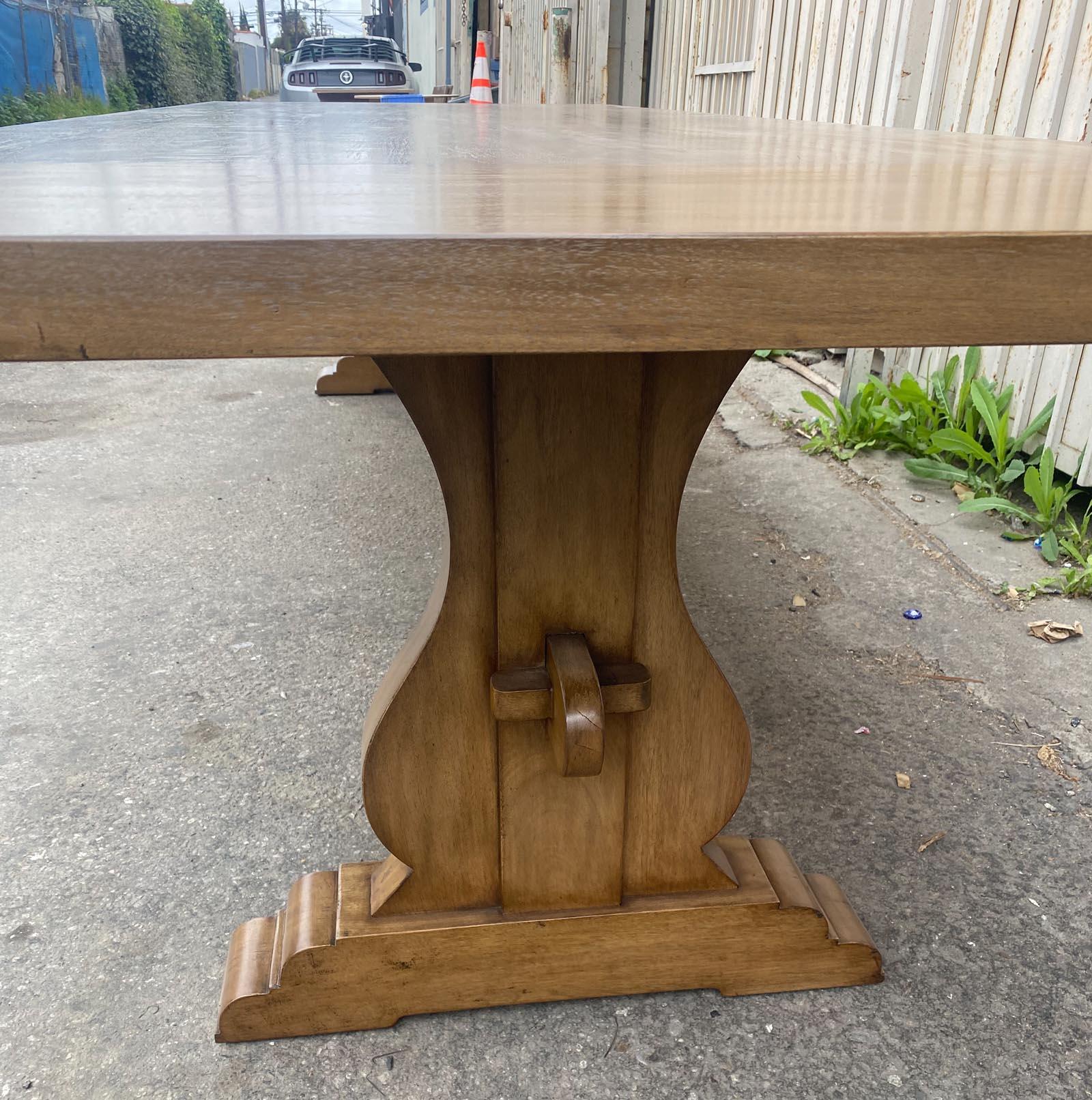 This is our Dos Gallos Custom Trestle Table. Shown here in Cathedral White Oak with a  #1 walnut finish and medium distress. There is 17