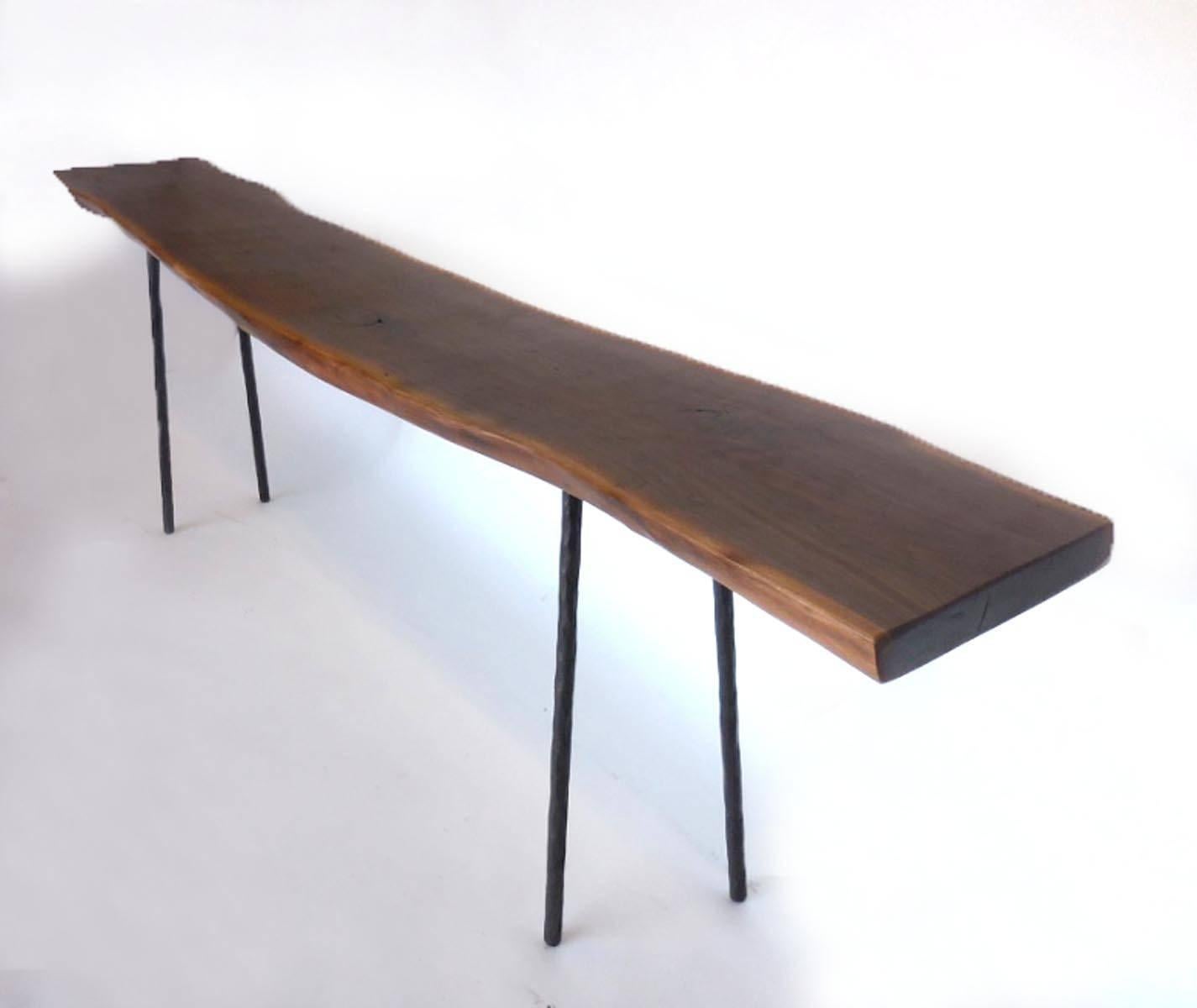 One of a kind black walnut live edge console with hand-forged iron legs. Gorgeous wood! Narrow profile. Elegant, modern , clean, airy, organic shape.
