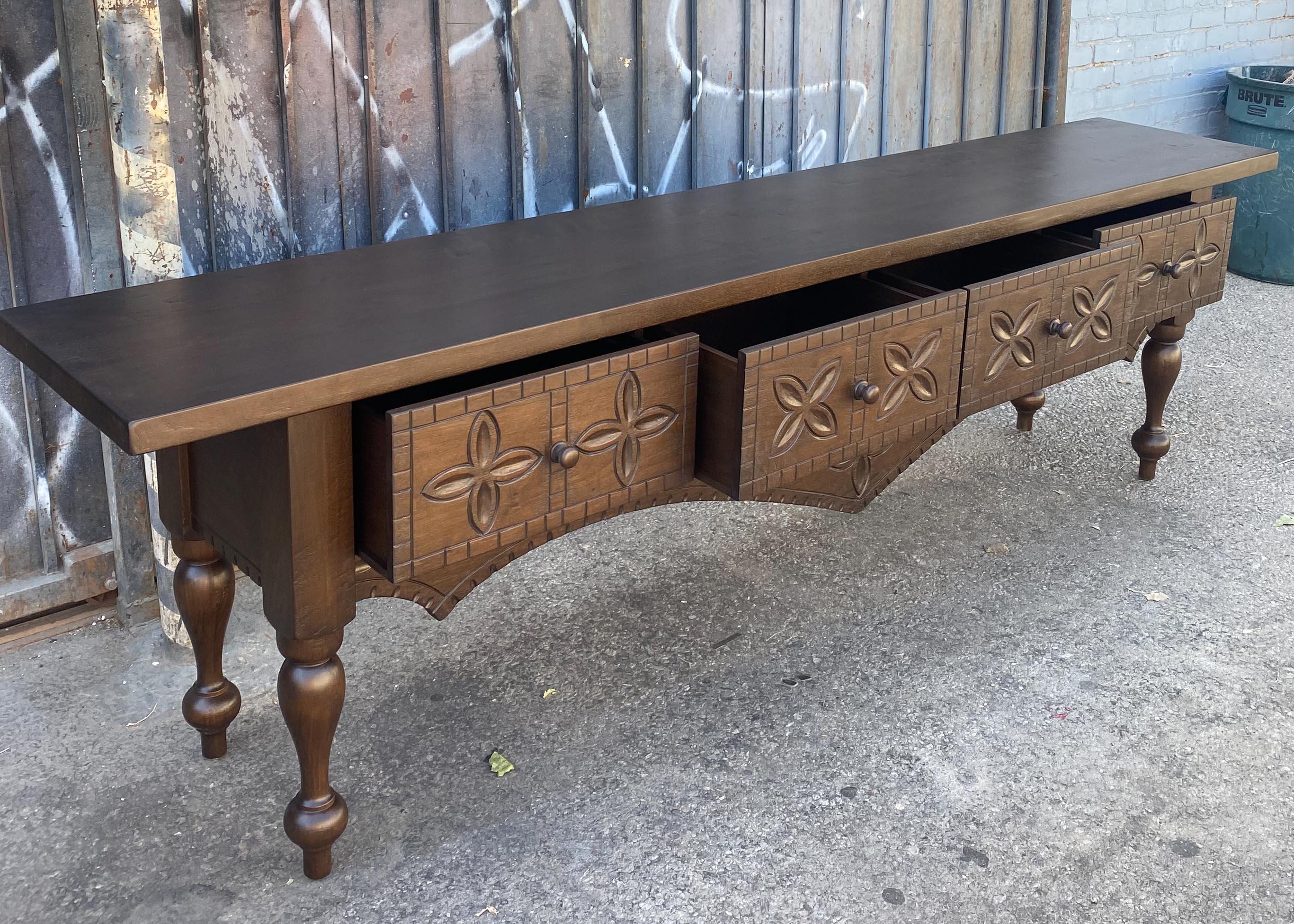 This is our custom carved Nahuala (animal spirit) console, based on traditional Nahuala tables from the highlands of Guatemala.  This can be done in custom sizes and finishes. As shown, in Walnut with our Walnut #3 finish and light distress. Colors
