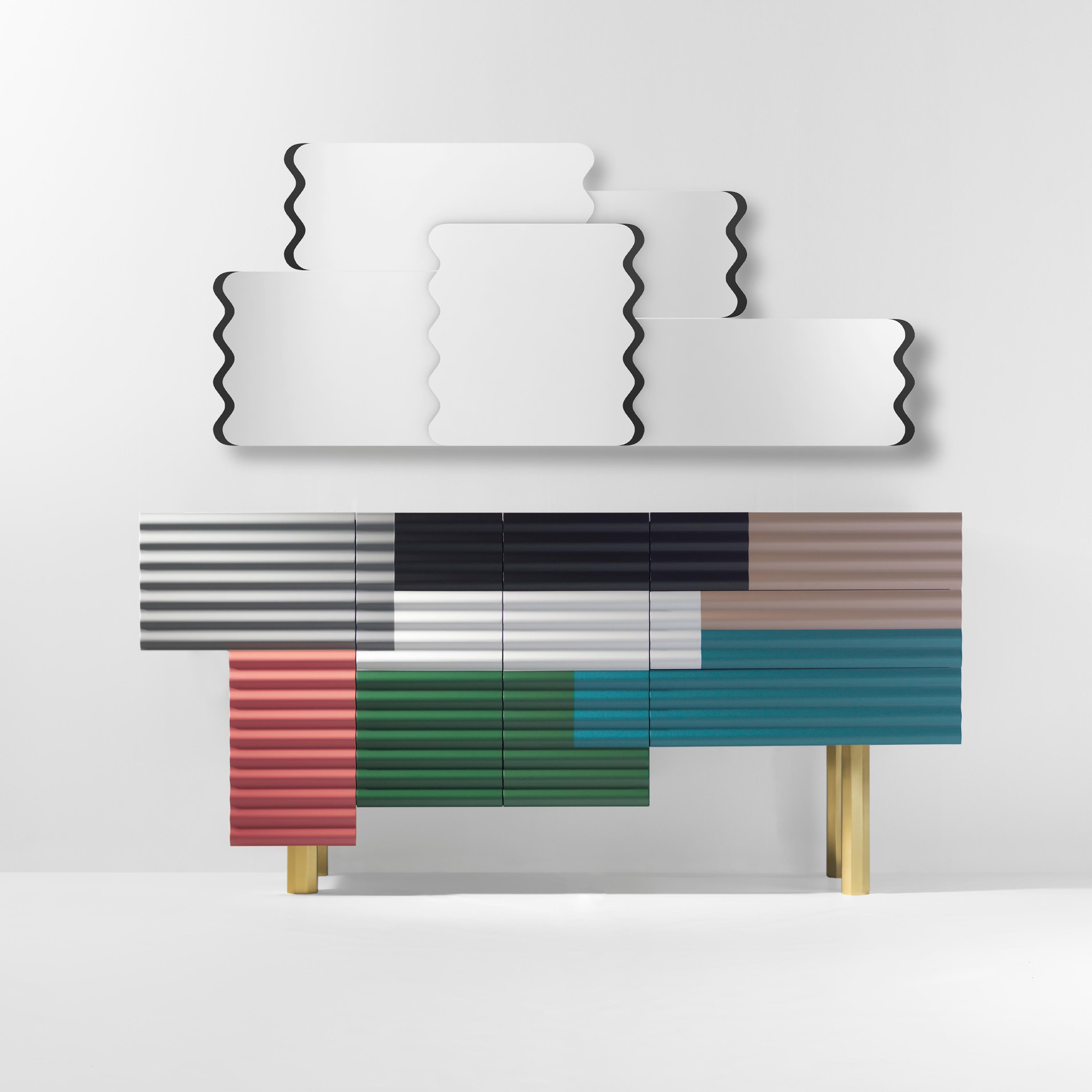 Shanty cabinet designed by Doshi Levien in 2014 manufactured in Barcelona by BD.

Shanty is inspired in the patchwork of corrugated steel sheets which are used to construct many temporary or provisional homes, which exist in the whole world. Its
