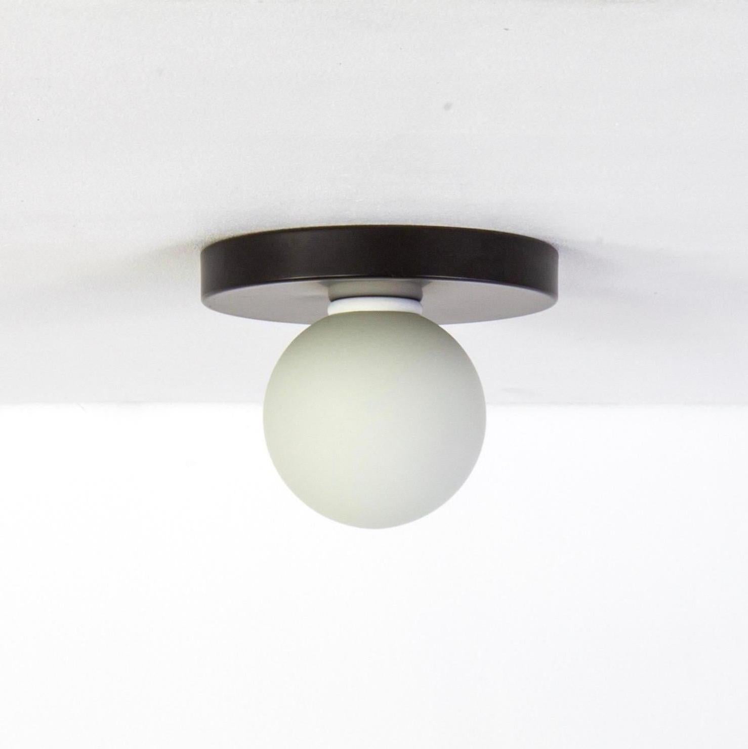 This listing is for 1x Globe Flush Mount in black designed and manufactured by Research.Lighting.

Materials: Brass, Steel & Glass
Finish: Black
Electronics: 1x G9 Socket, 1x 4.5 Watt LED Bulb (included), 450 Lumens
ADA Compliant. UL Listed. Made in