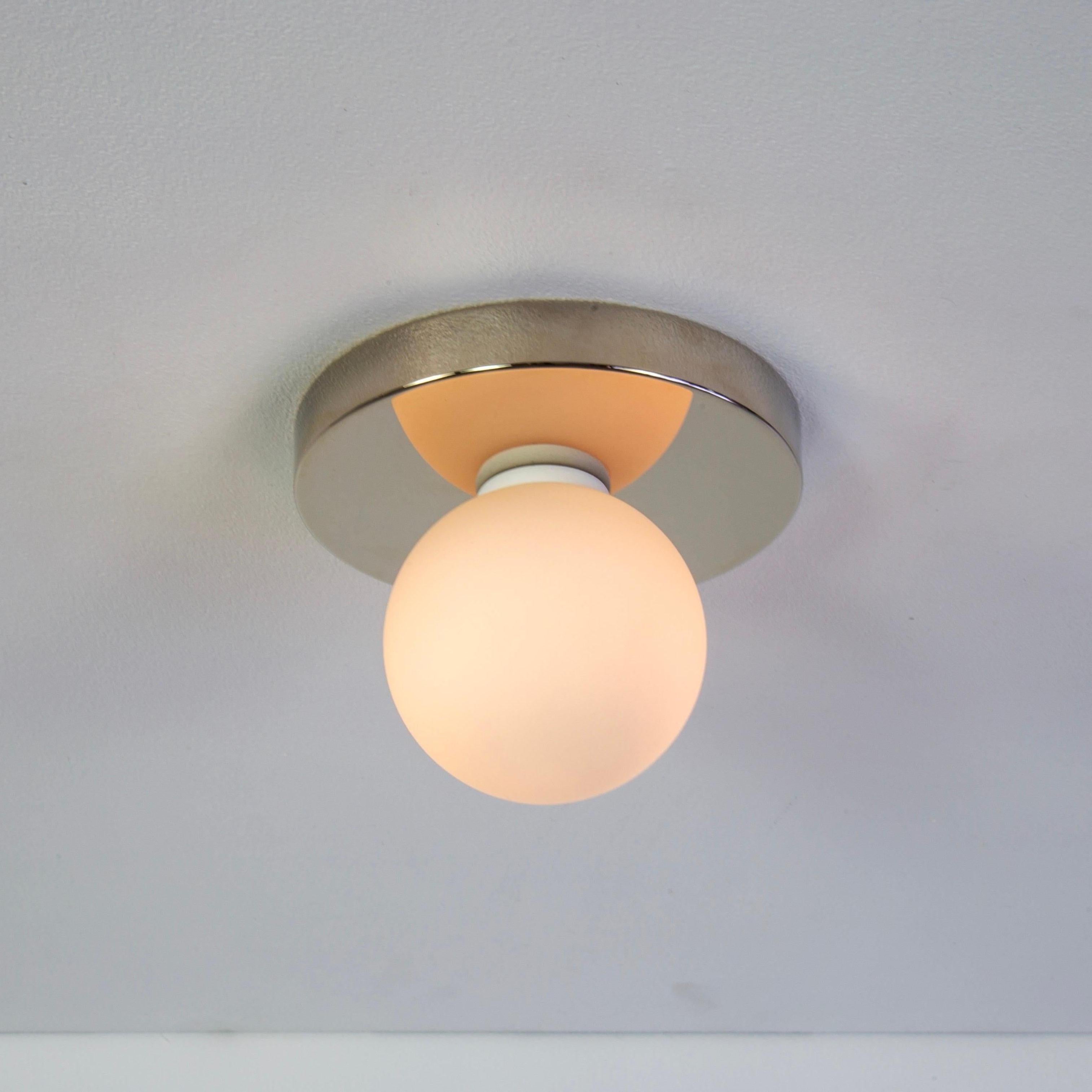 This listing is for 1x Globe Flush Mount in polished nickel designed and manufactured by Research.Lighting.

Materials: Brass, Steel & Glass
Finish: Polished Nickel
Electronics: 1x G9 Socket, 1x 4.5 Watt LED Bulb (included), 450 Lumens
ADA