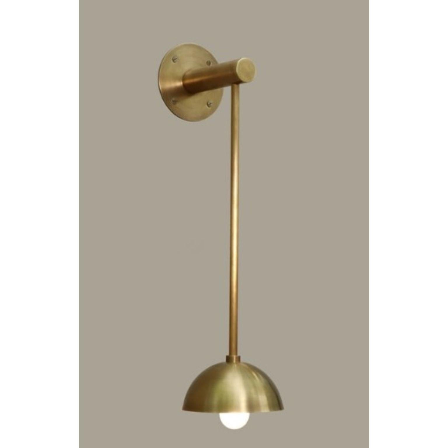 Dot Long Brass Dome Wall Sconce by Lamp Shaper
Dimensions: D 15 x W 19 x H 53.5 cm.
Materials: Brass.

Different finishes available: raw brass, aged brass, burnt brass and brushed brass Please contact us.

All our lamps can be wired according to