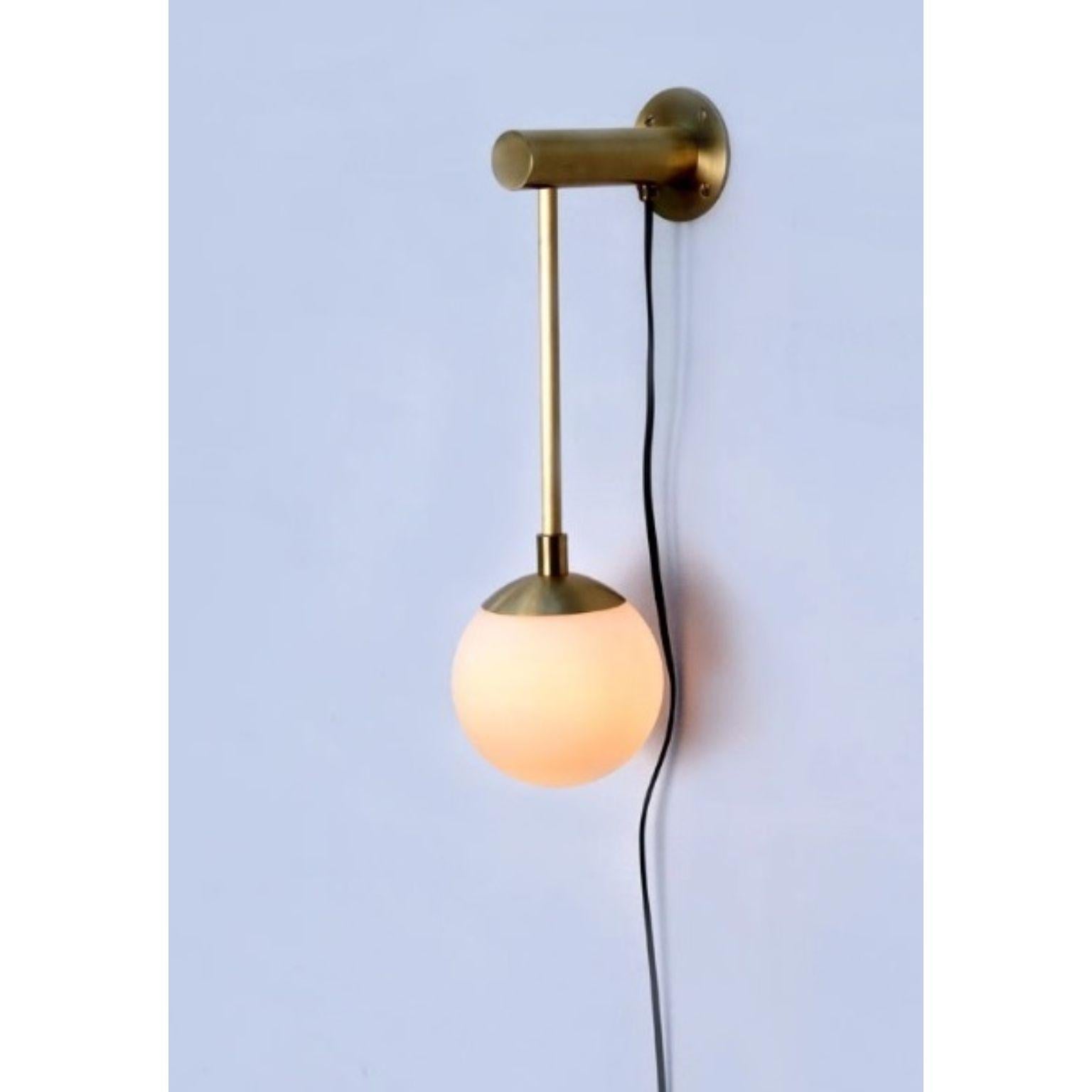 Dot Medium Glass Globe Wall Sconce by Lamp Shaper
Dimensions: D 15 x W 19 x H 51 cm.
Materials: Brass and glass.

Different finishes available: raw brass, aged brass, burnt brass and brushed brass Please contact us.

All our lamps can be wired