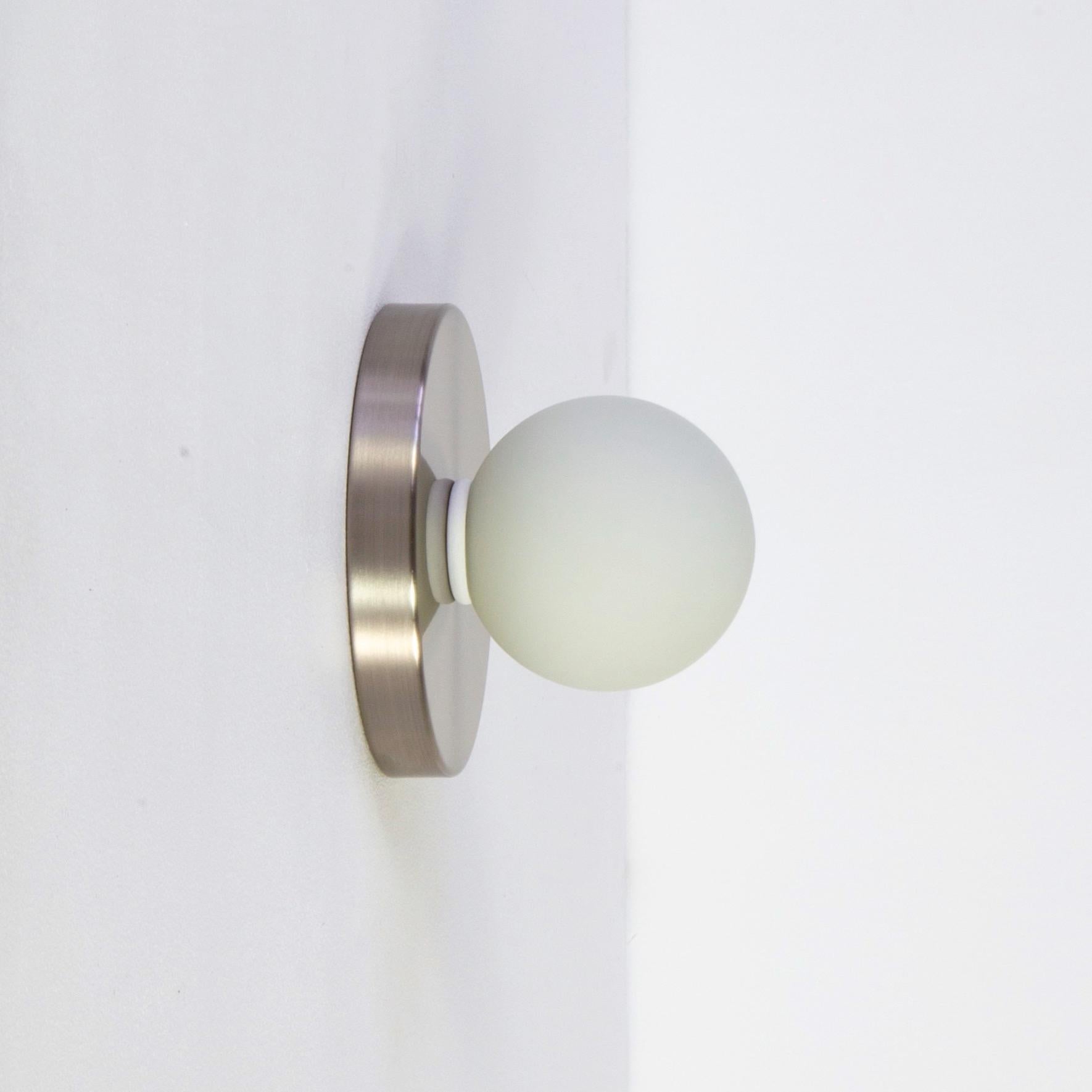 This listing is for 1x Globe Sconce in brushed nickel designed and manufactured by Research.Lighting.

Materials: Brass, Steel & Glass
Finish: Brushed Nickel
Electronics: 1x G9 Socket, 1x 4.5 Watt LED Bulb (included), 450 Lumens
ADA Compliant. UL