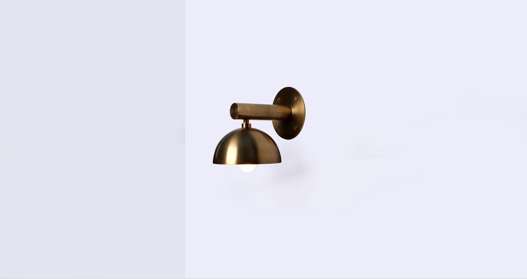 Dot Small Brass Dome Wall Sconce by Lamp Shaper
Dimensions: D 15 x W 19 x H 20.5 cm.
Materials: Brass.

Different finishes available: raw brass, aged brass, burnt brass and brushed brass Please contact us.

All our lamps can be wired according to