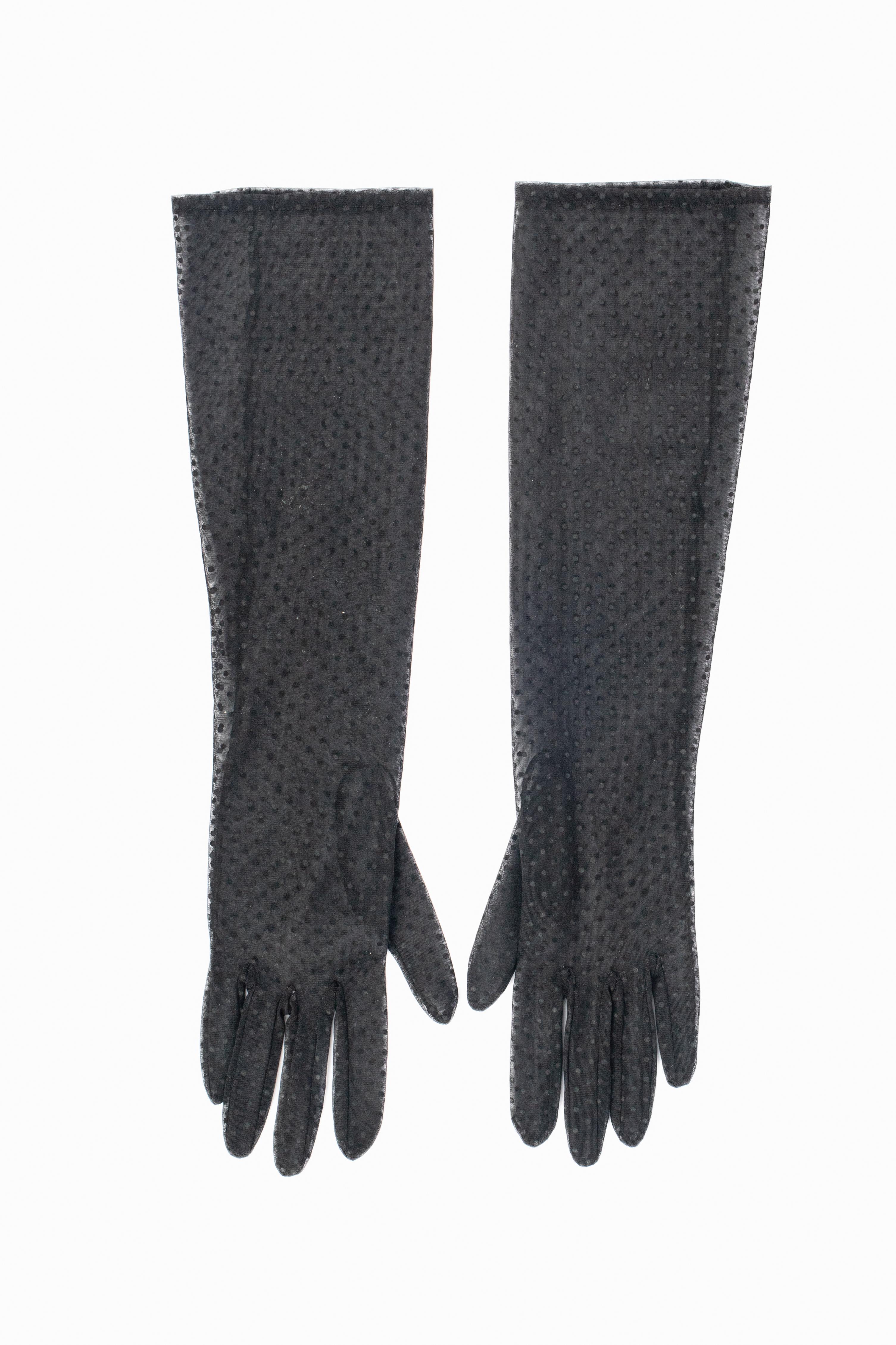 UNKNOWN - Guanti neri trasparenti di media lunghezza con punti neri.

Condizioni:
Ottime condizioni

Dimensioni:
Lunghezza: 41,5 cm

SKU:ACC134