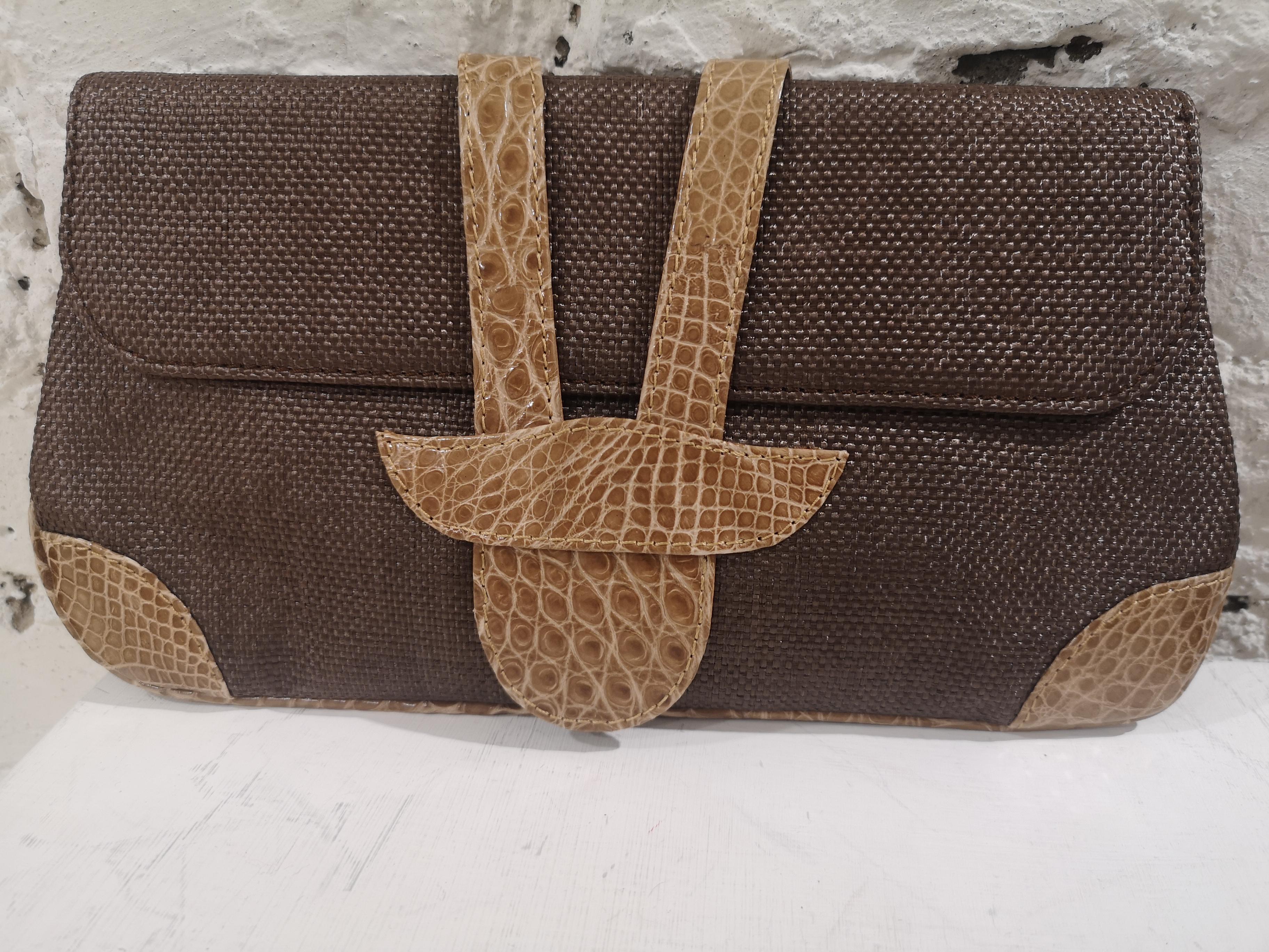 Dotti brown textile and croco print leather clutch 
measurements: 27 cm * 15 cm