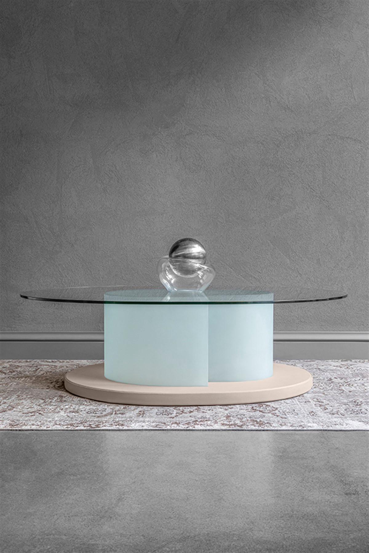 DOTTIE series adapts to every living space with its minimal design, comfort and modular installation. DOTTIE dark and light coffee table, which strengthens the transparent coolness of glass with its dark and light color bottom design, provides a