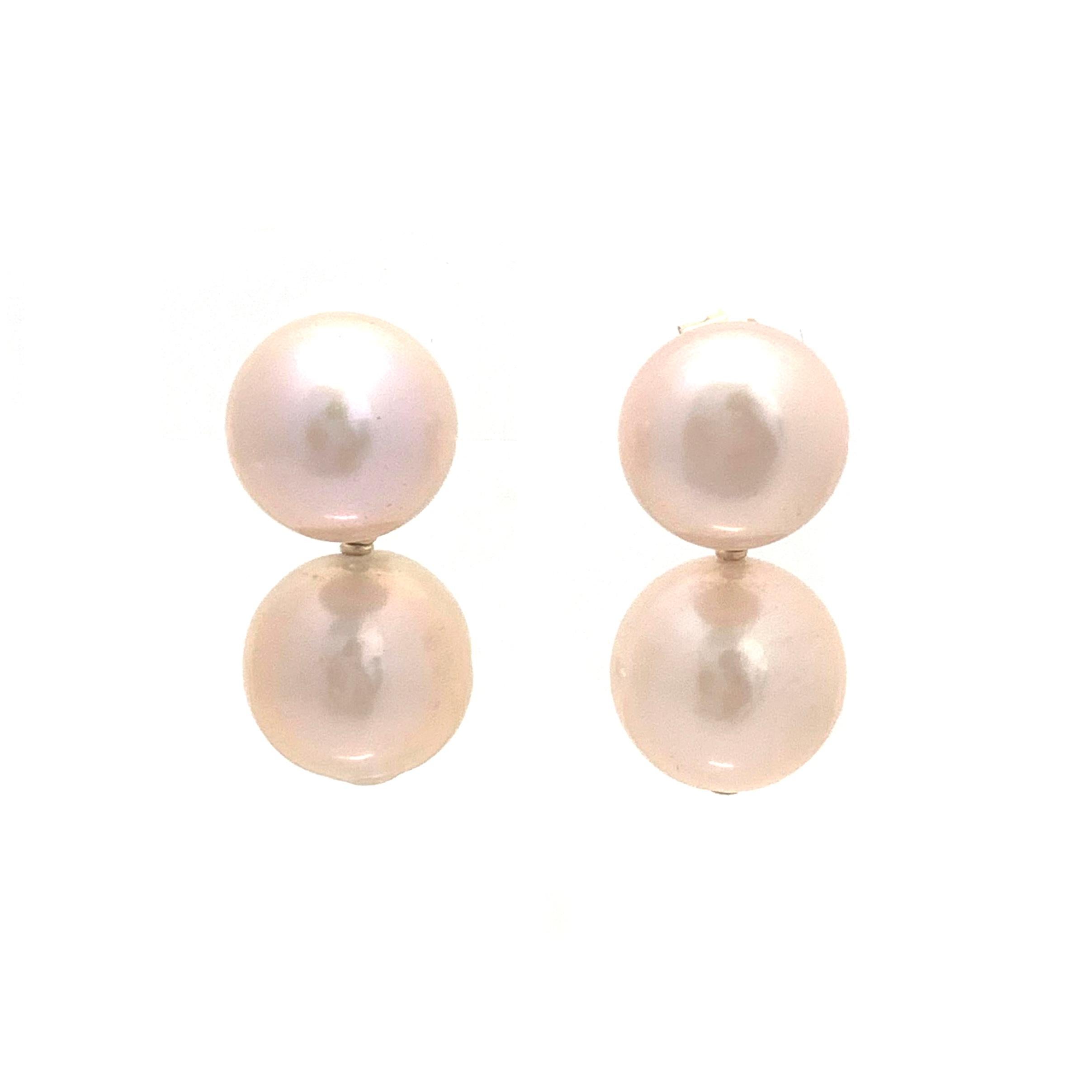 Classic elegant double peach-tone cultured pearl drop earrings. Beautiful lustrous peach-tone fresh water cultured pearl with 18k gold filled post and large friction back with comfort and properly secure. The top pearls measure 12mm and the bottom