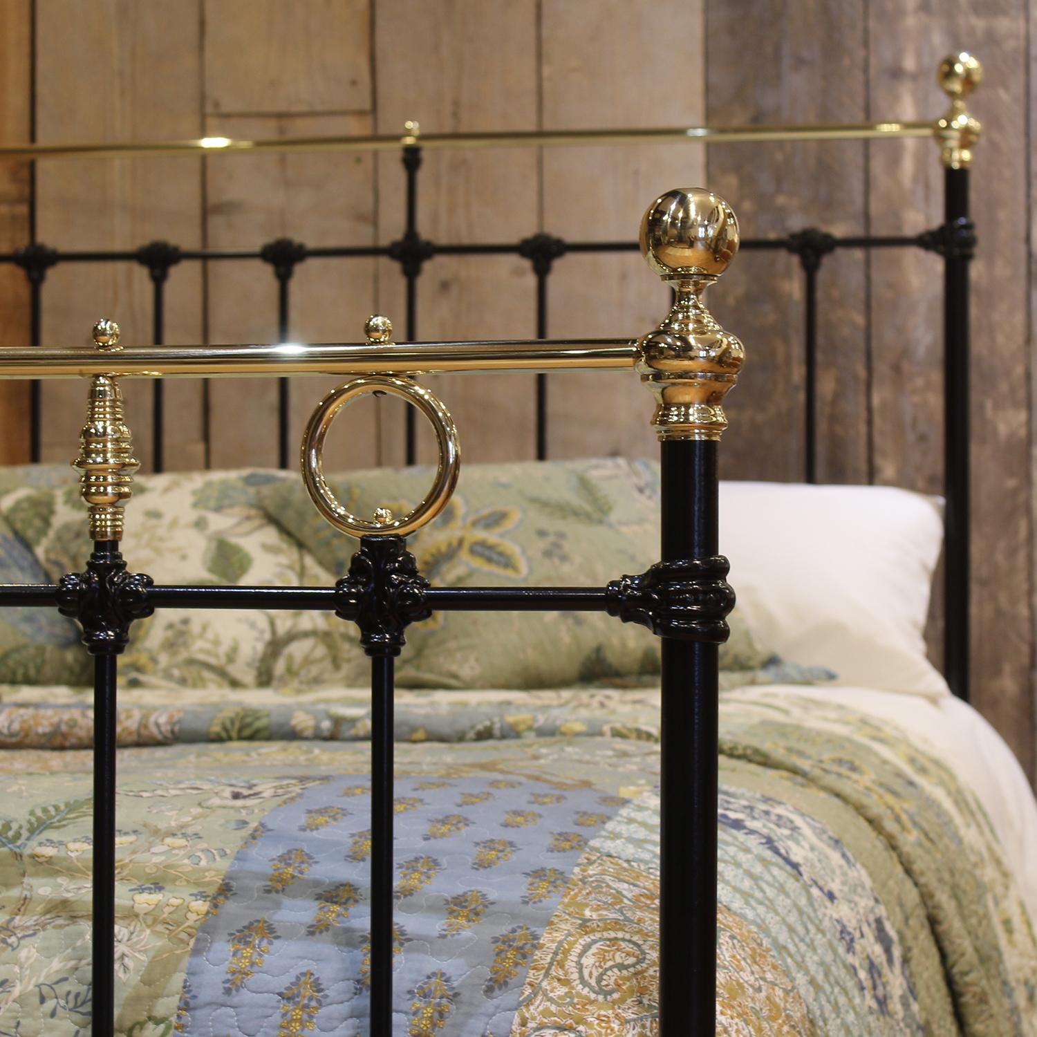 British Double Antique Cast Iron and Brass Bed in Black with Decorative Features, MD162 For Sale