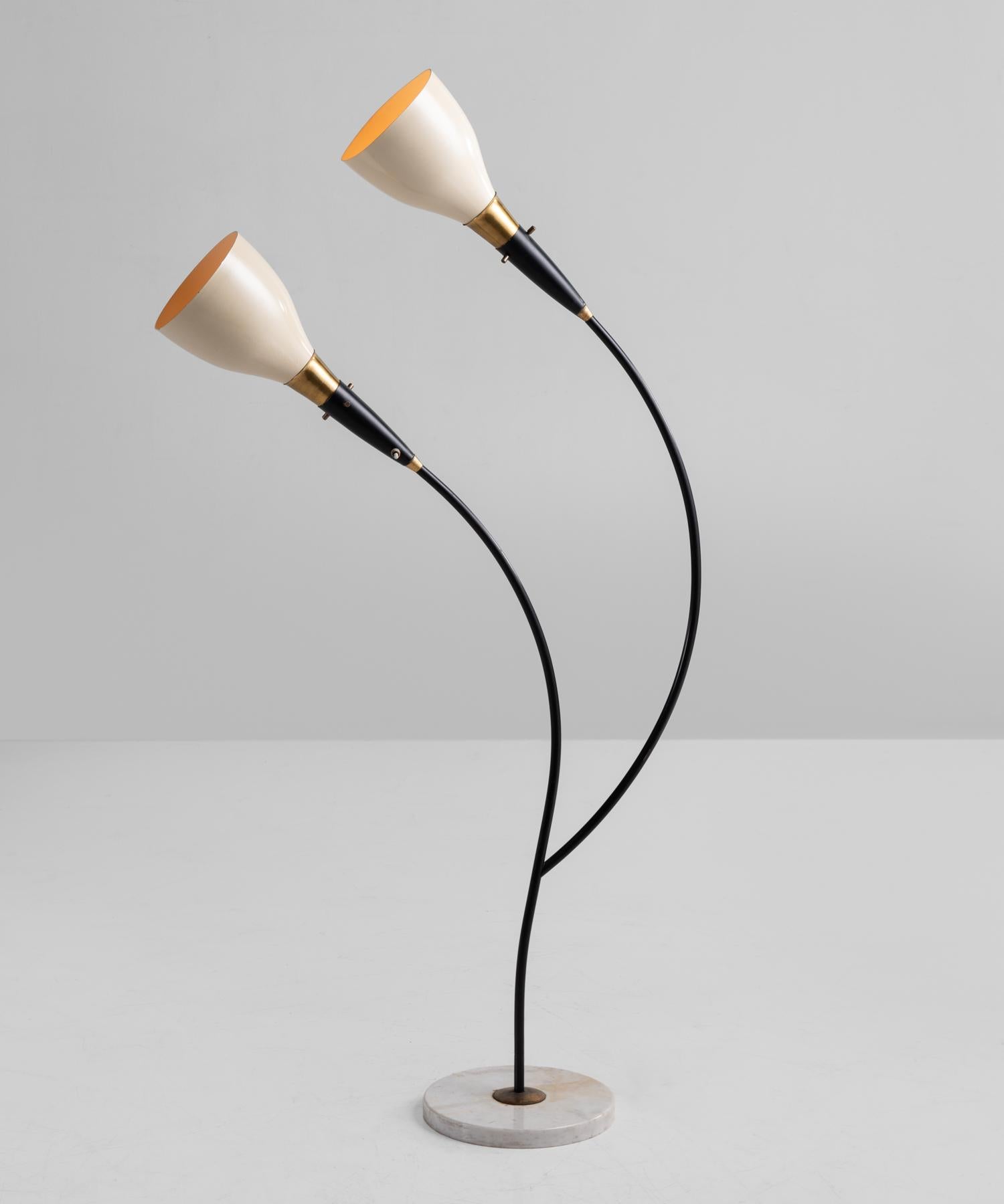Double arc floor lamp, circa 1960

Unique form with brass hardware and cream enamel shades on marble base.