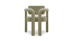 Modern sculptural light green velvet Double Arch dining chair by InsidherLand