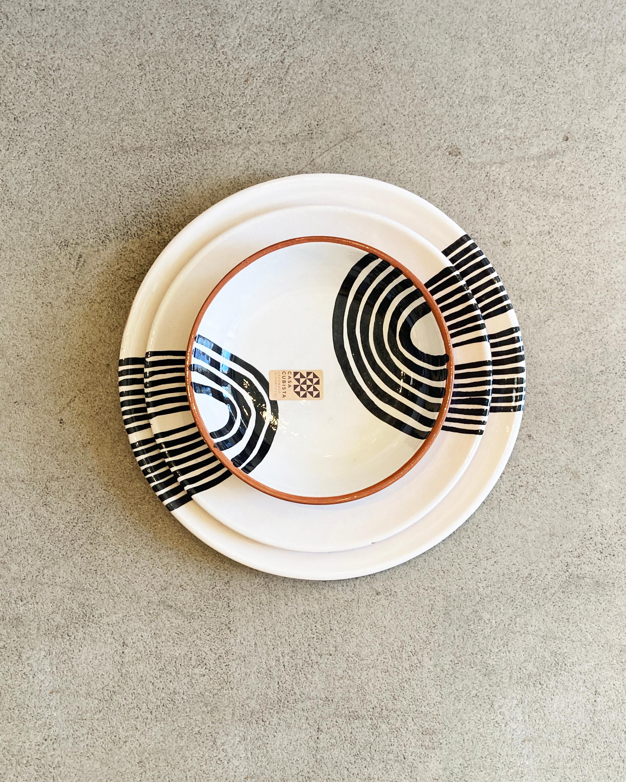 Handmade and hand painted ceramics from one of the mother countries, Portugal, these beautiful pieces for your table will add a modern and graphic touch and are perfect to mix and match. 

Sizes
Dinner Plate: 10.5”dia x 1.2”high
Salad Plate: