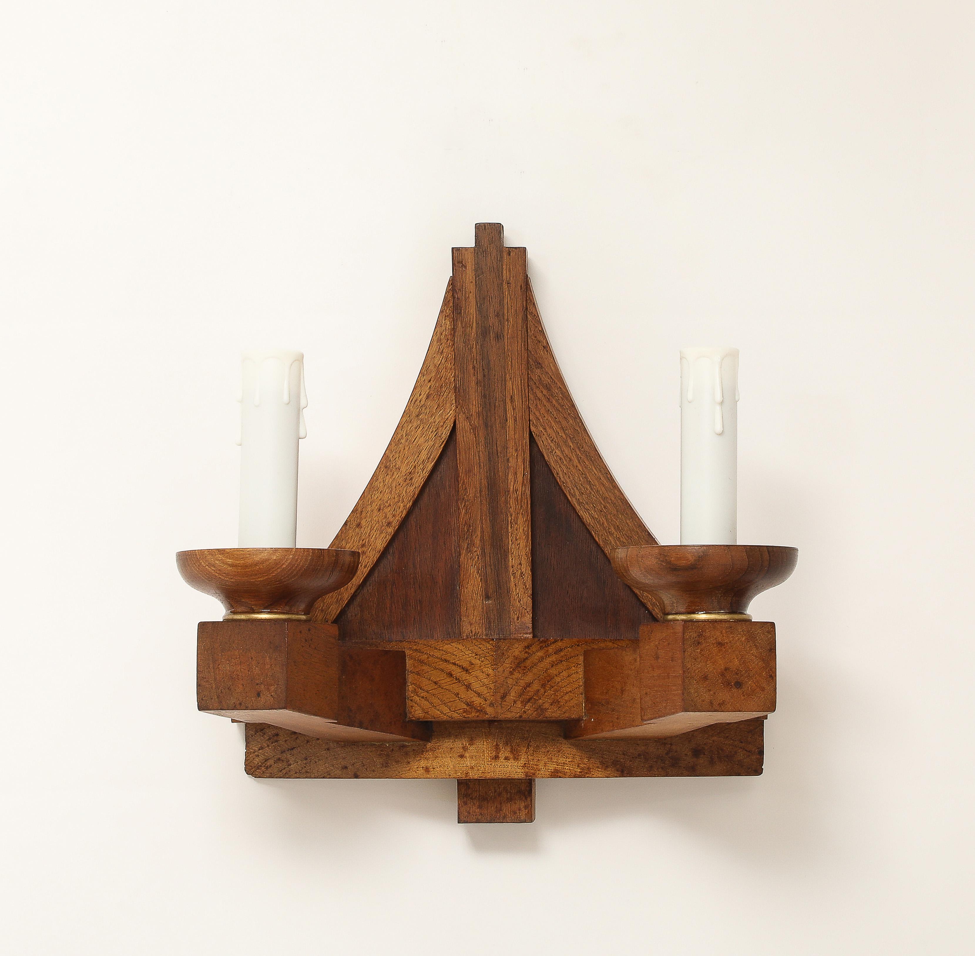 One of a kind pair of solid French oak double arms pyramid shaped sconces in the style of Guillerme and Chambron. 1940's modernist style.
These sconces have been rewired for use in the US.