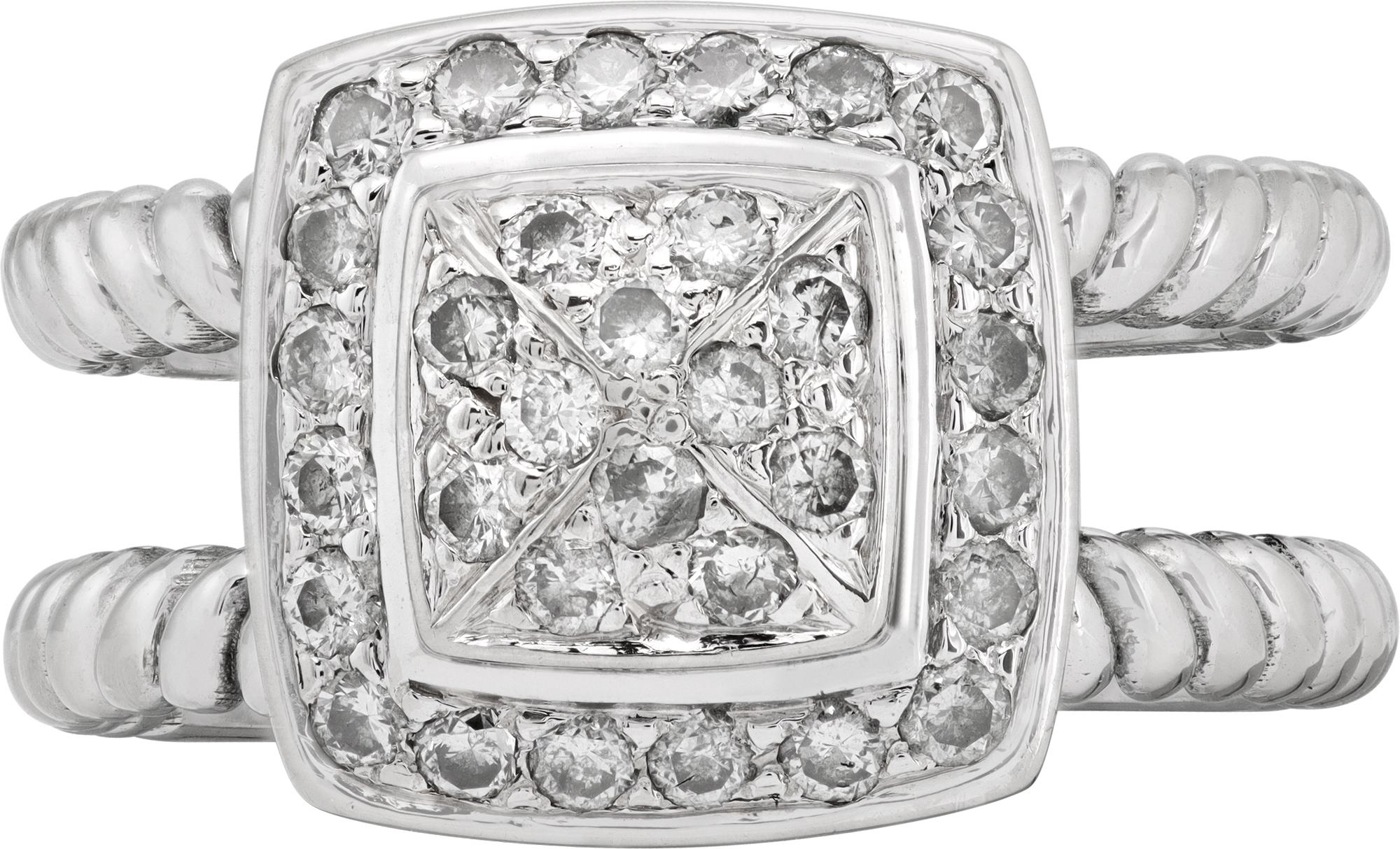 Diamond ring in 18k white gold, double banded and halo set with approximately 0.50 carats in pave diamonds (G-H color, VS-SI clarity). Size 7.5

This Diamond ring is currently size 7.5 and some items can be sized up or down, please ask! It weighs
