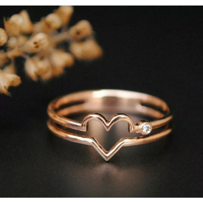 An simple but unique ring with double bands forming a heart in the center and a sparkling diamond on the side. It's you and your better half.. both your hearts :)
Love Heart Ring 14k Gold Double Band Ring Lovers Ring Diamond Band Birthday Gift
Light