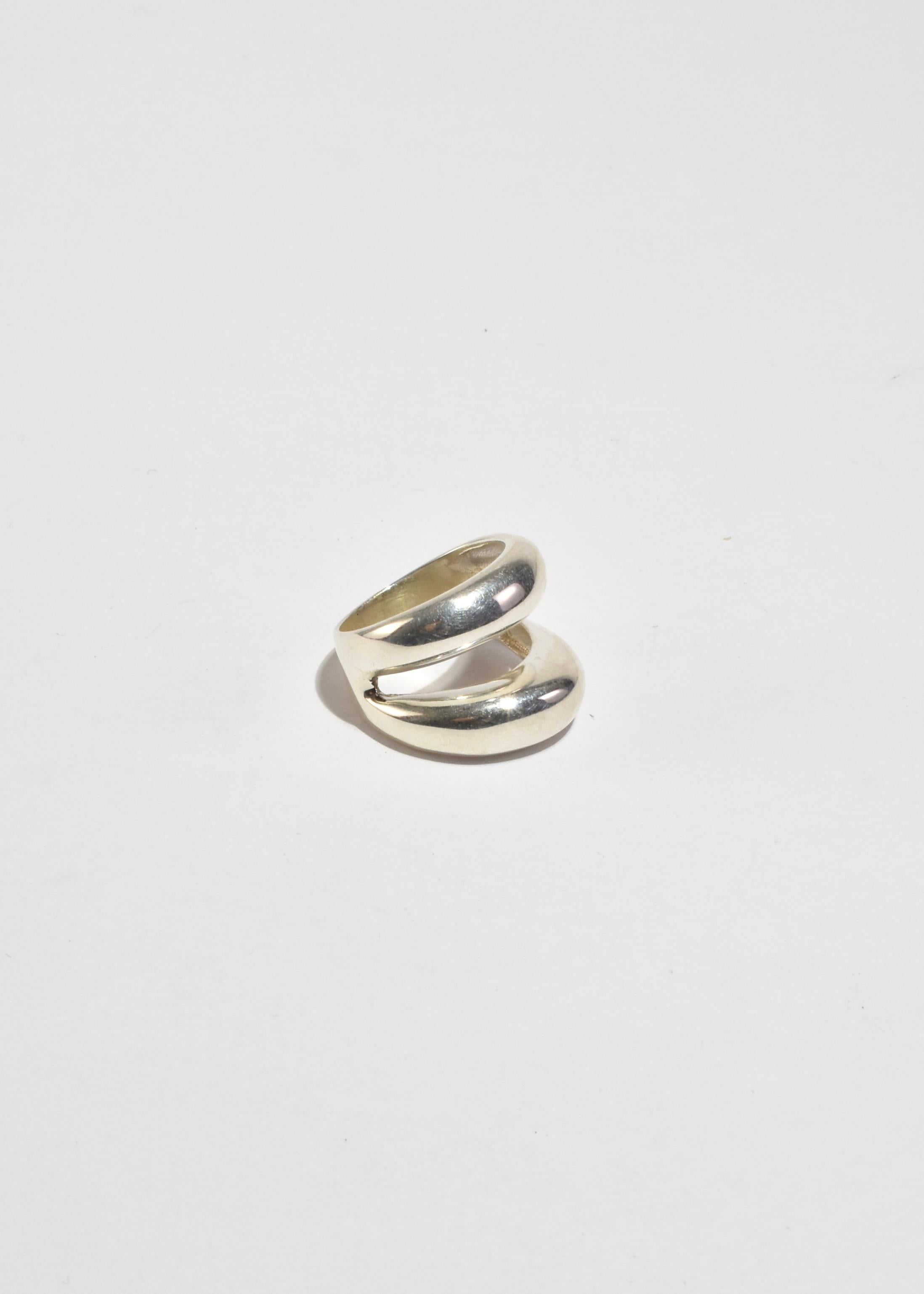 Beautiful, sterling ring with sculptural double band detail. Stamped 925.