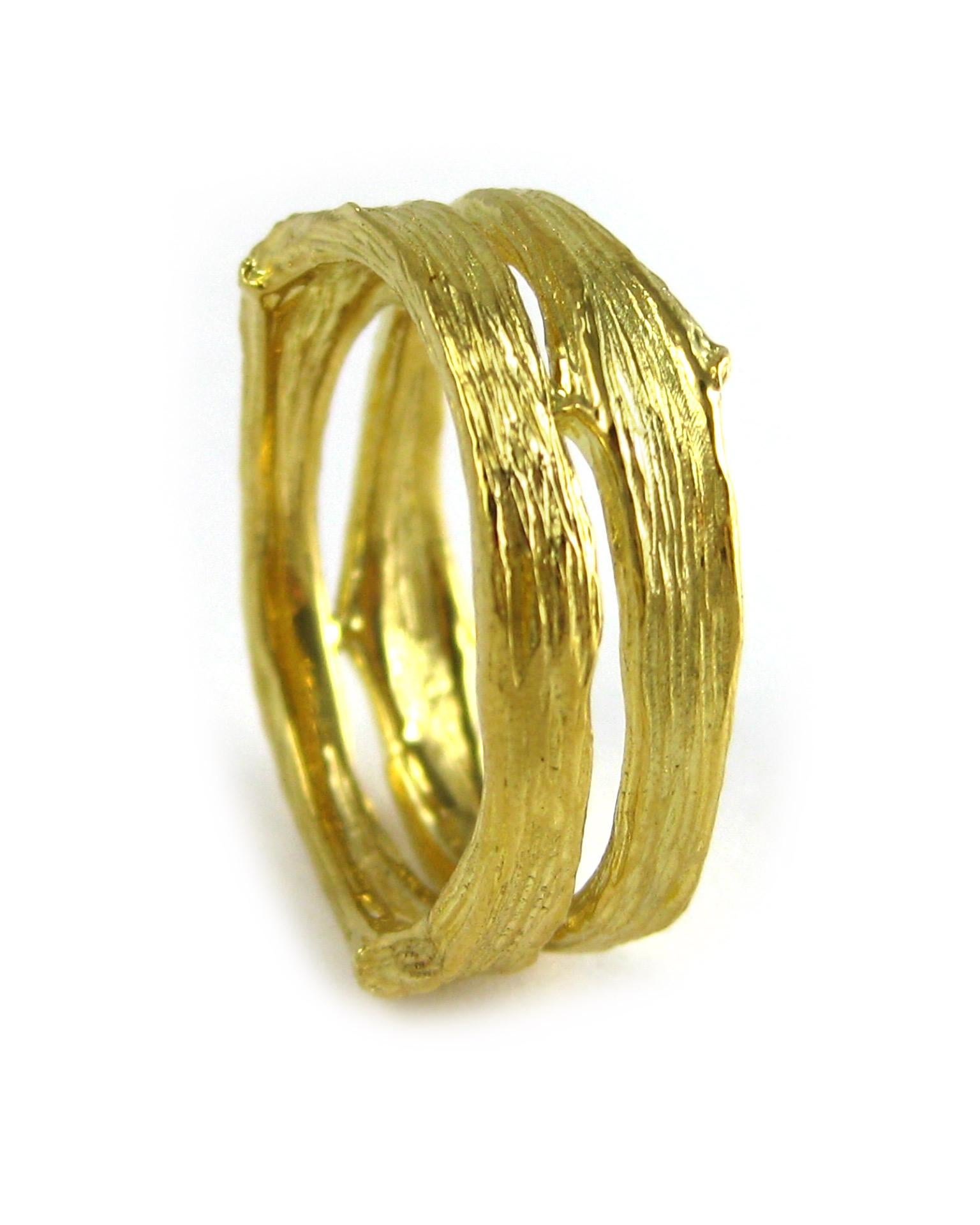 Channeling the eternal Tree of Life, the organic spirit of K. Brunini is captured through this Gents medium double-band Twig ring in 18k yellow gold. 

In the Twig Collection, nature exists alongside elegant luxuries, but the lines blur: Rough