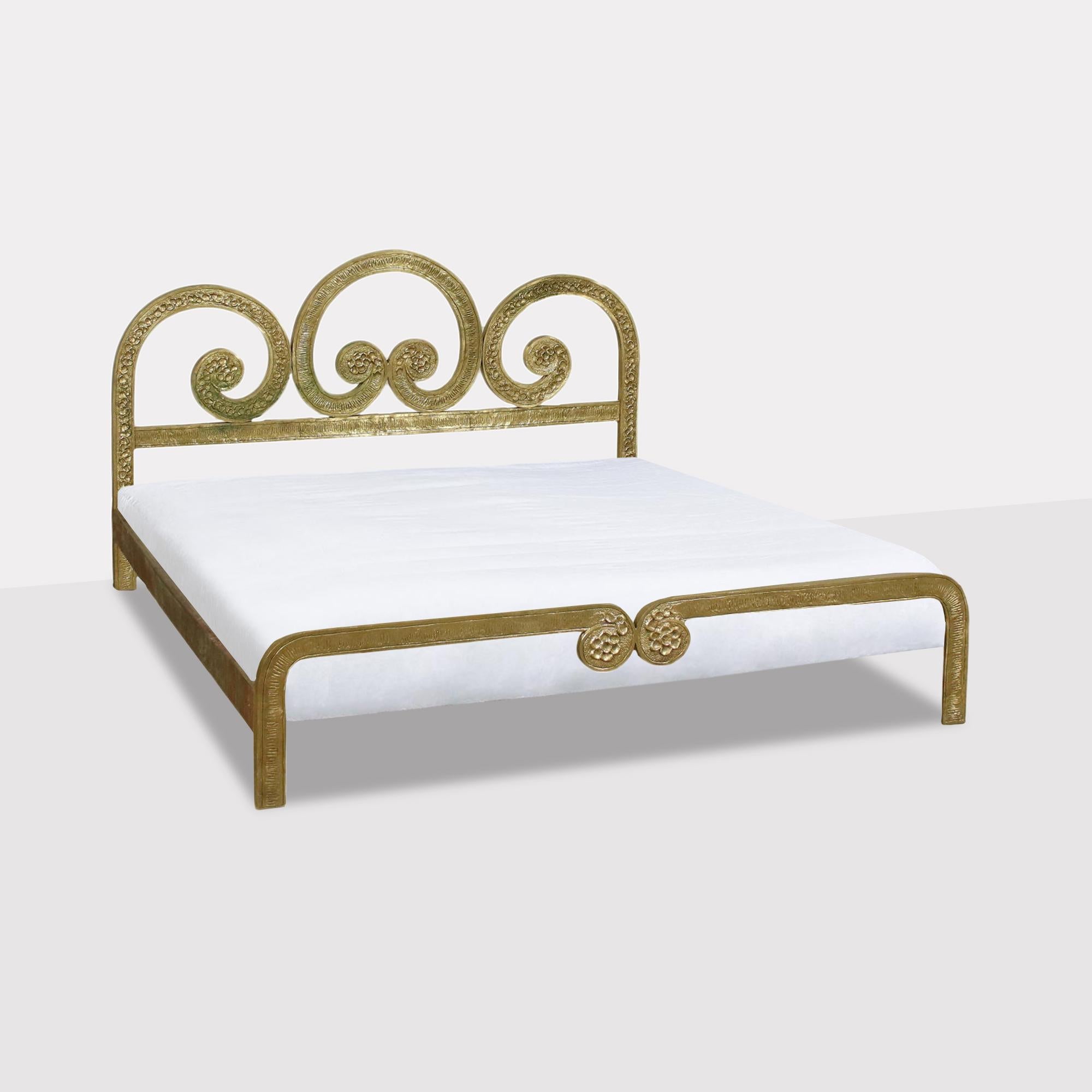 Rare double bed model 'Consuelo' designed by the Italian artist Angelo Brotto and manufactured by Esperia, Poggibonsi (SI), circa 1970. The headboard and footboard are made in cast bronze hand sculpted bas-relief, the rest of the structure is made