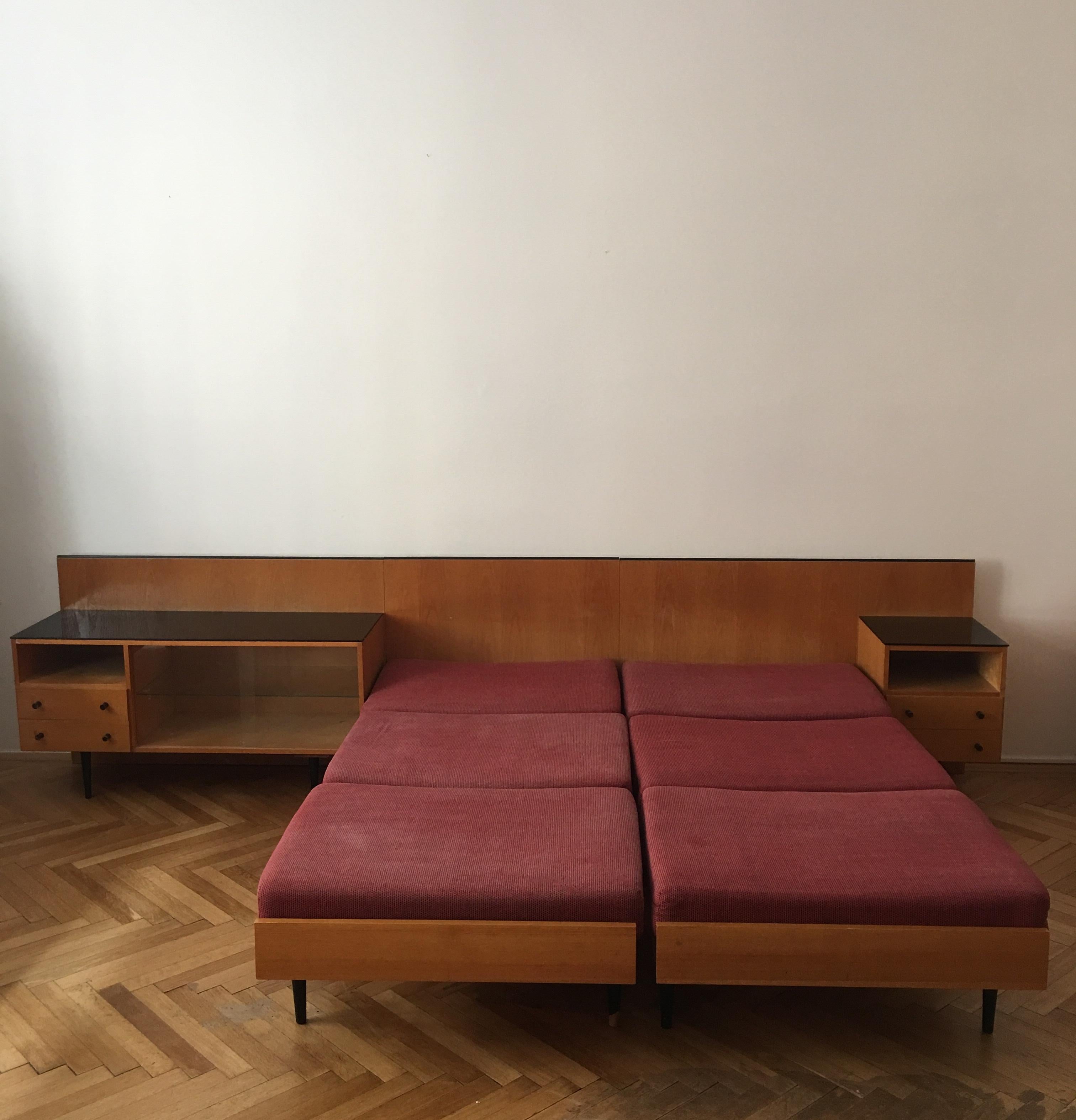 Double bed with nightstands by Mojmir Pozar for UP Zavody, 1960s. In very perfect condition.
Made in Czechoslovakia in 1960s in UP Zavody – Bucovice / Rousinov.
Every piece in middle century had own designer. This item is designed by architect and
