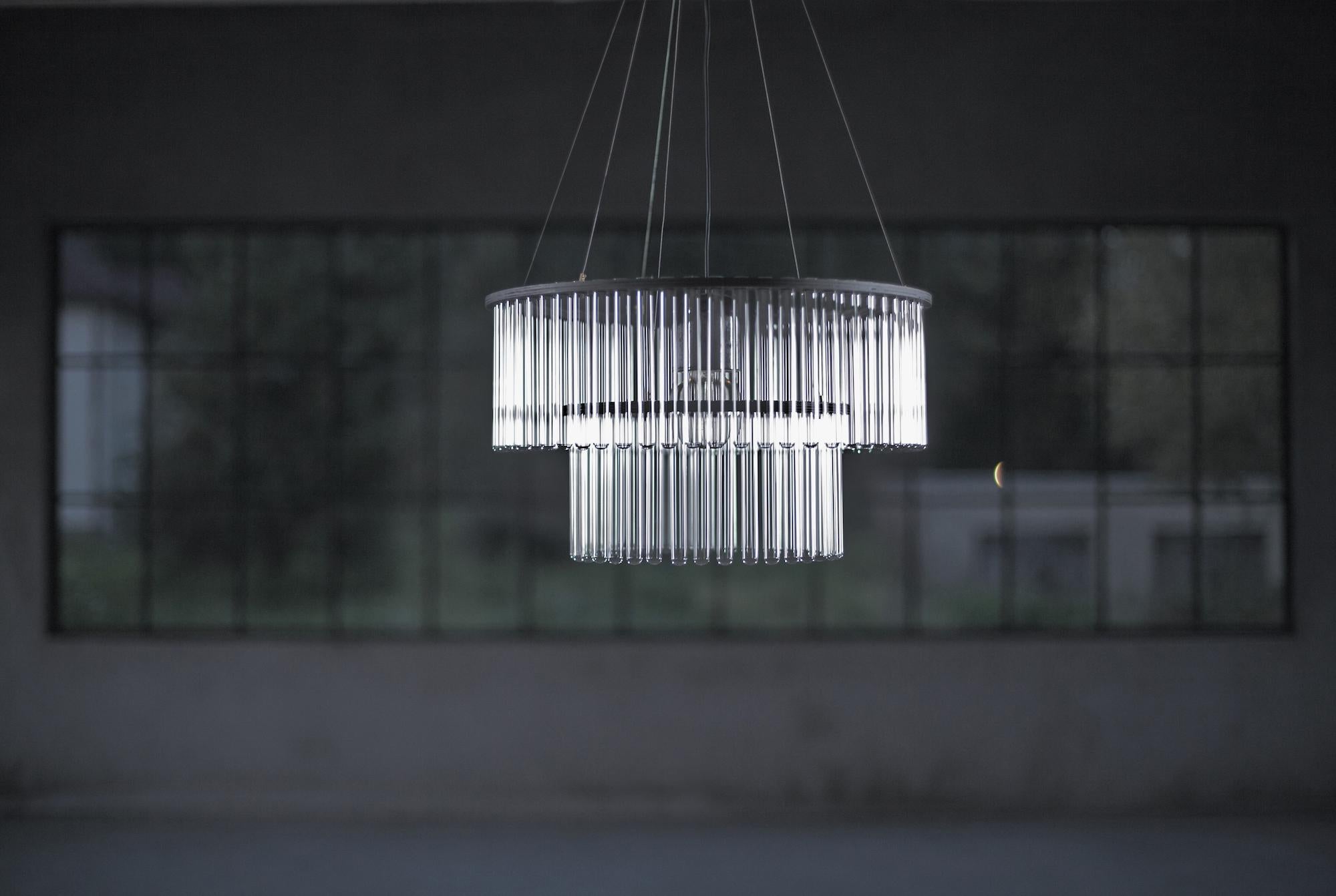 Double black Maria SC chandelier by Pani Jurek
Dimensions: D 47 x W 47 x H 110 cm.
Material: black stained plywood, glass.
Available single or double, natural or black. The standard length of the lamp is 110 cm. Other lengths available on request.
