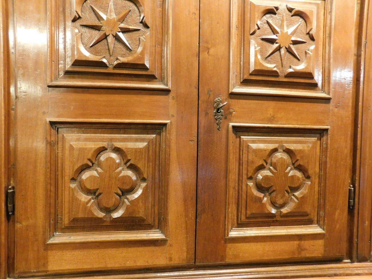 18th Century and Earlier Double-body cabinet in richly carved walnut wood, Tuscany For Sale