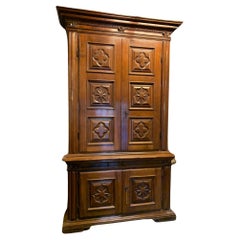 Double-body cabinet in richly carved walnut wood, Tuscany