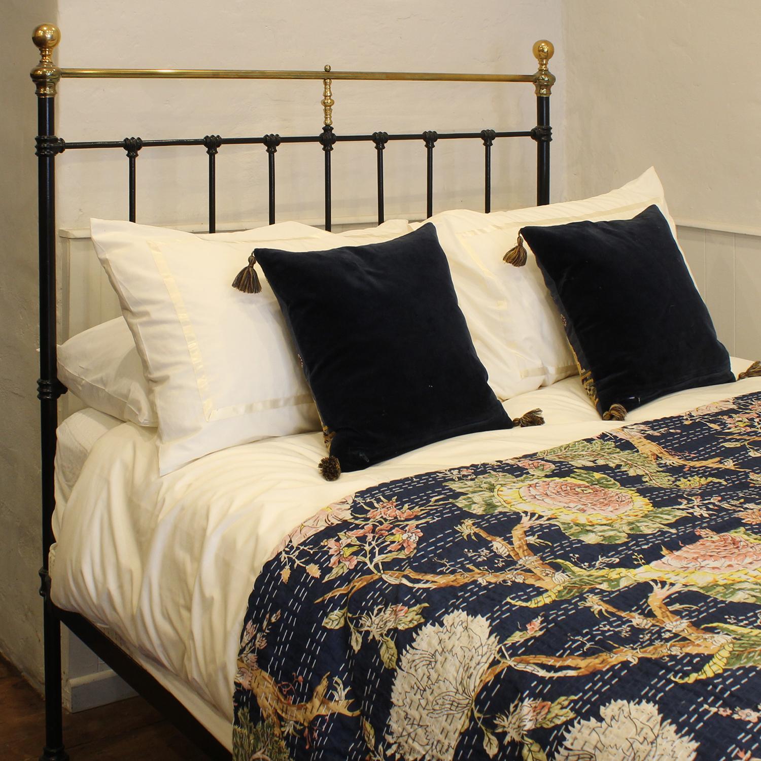 black and brass bed frame