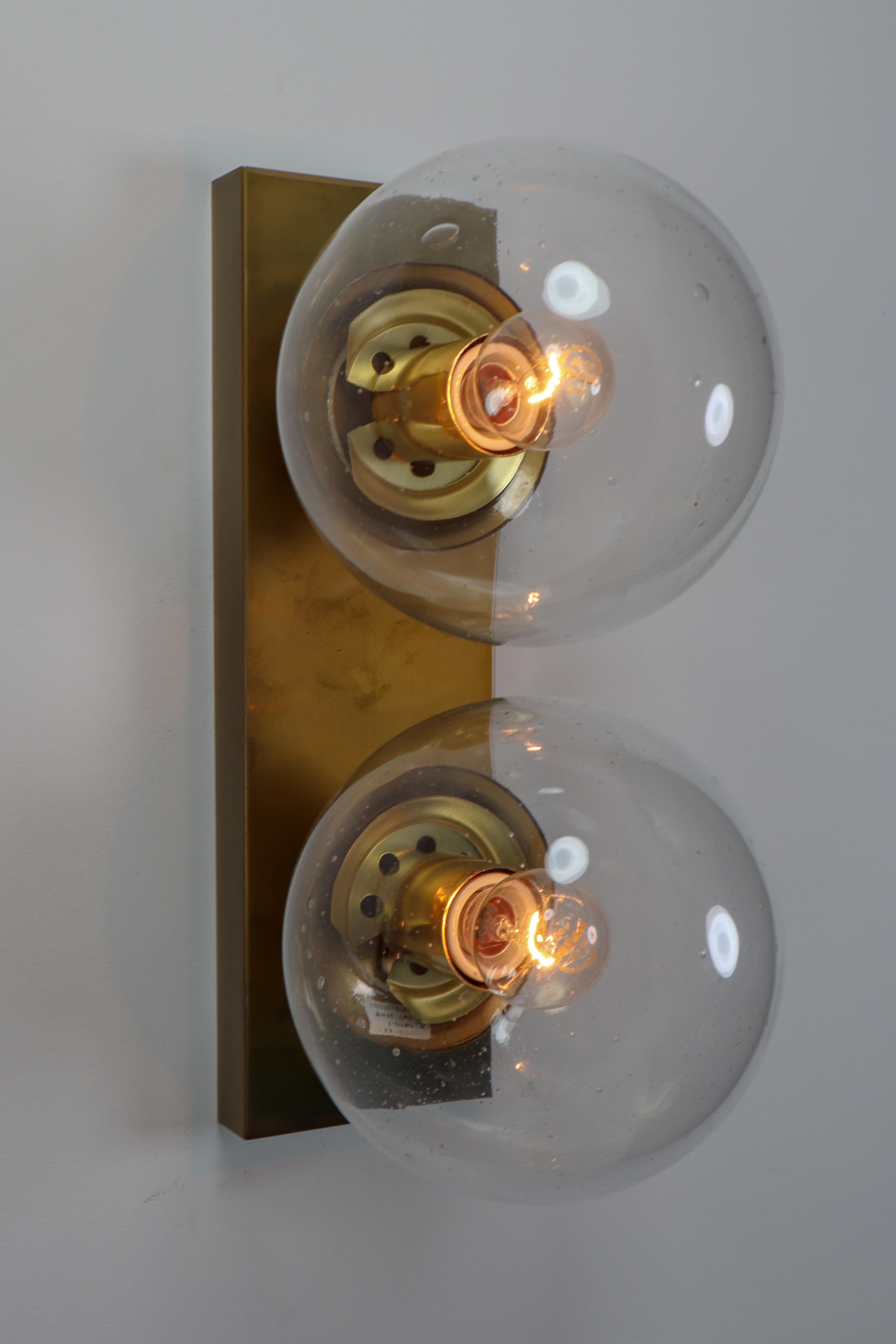 20th Century Mid Century Double Brass Wall Scones with Hand Blowed Glass Globes For Sale