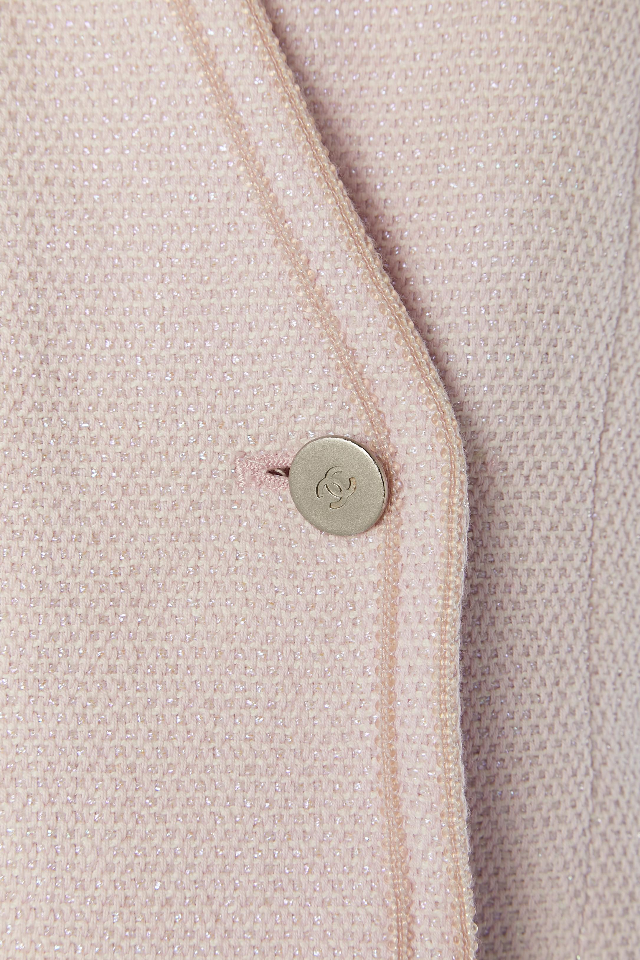 Pale pink double breasted jacket without collar. Branded buttons ( a bit damaged) 
Main fabric composition: 82% cotton, 16% polyester, 2% nylon + lurex .Silk lining. Chain inside the jacket on the bottom edge. 
Shoulder-pad.
SIZE 40 (Fr) 10 (Us) L 