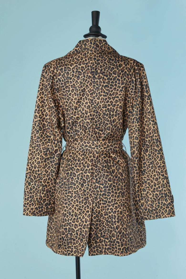 Double breasted raincoat with animal print in vendita 1