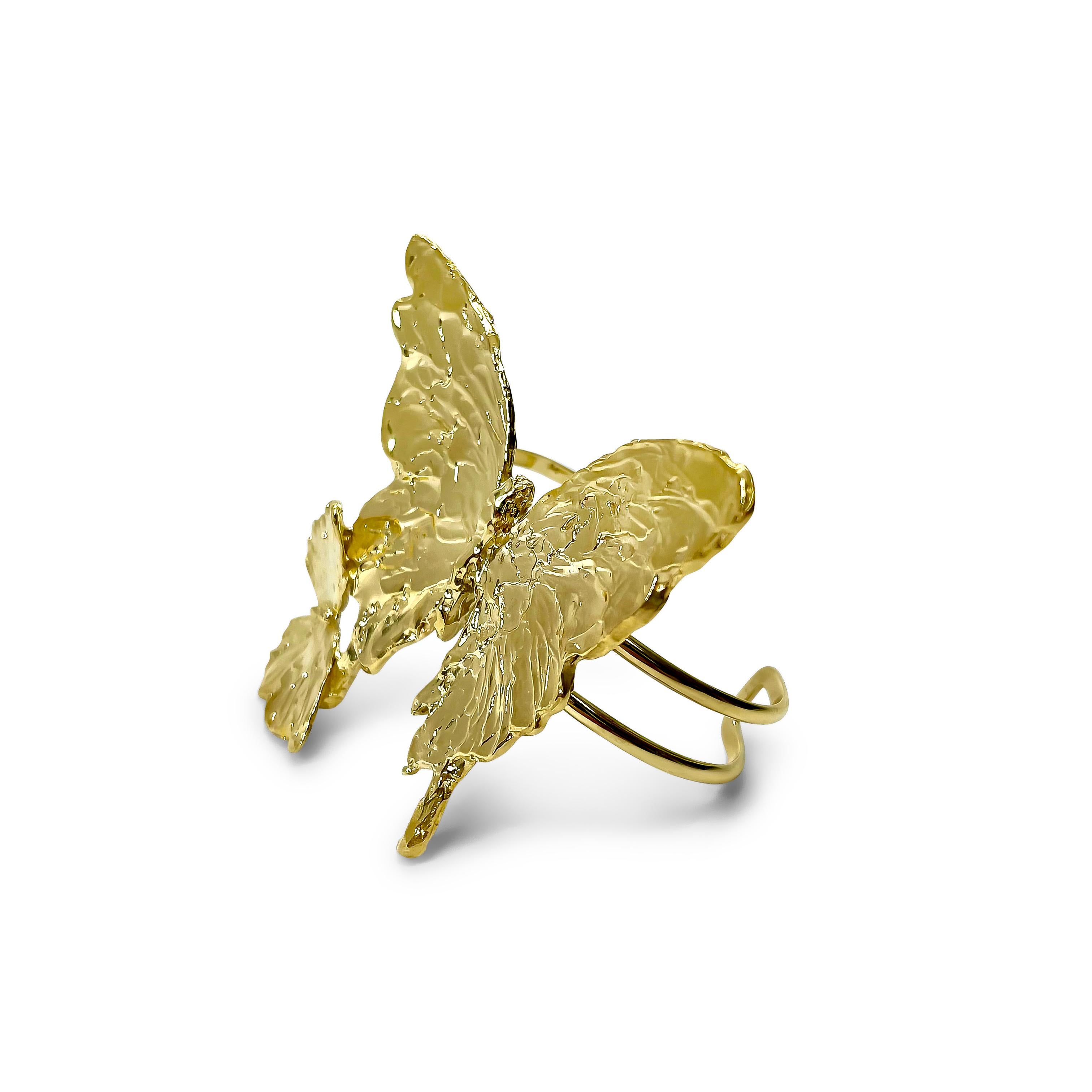 Intention: Wisdom

Design: Two hand carved butterflies fly in harmony, covering the expanse of the wrist  Comfortable Thai gold brass bands enclose the wrist comfortably so you'll never want to take this bracelet off!

Style Suggestions: ﻿Over a