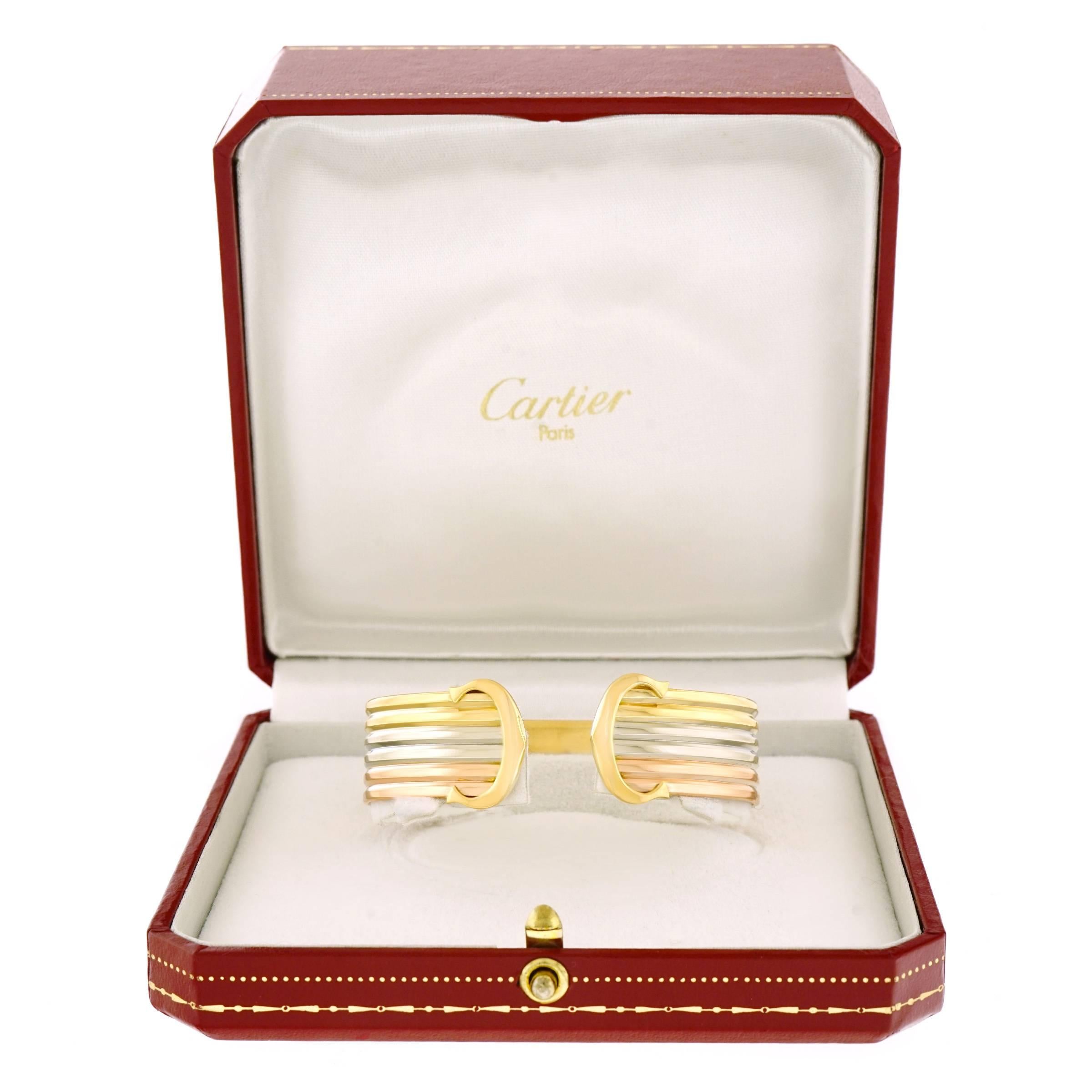 Double C de Cartier Logo Gold Cuff Bracelet In Excellent Condition In Litchfield, CT