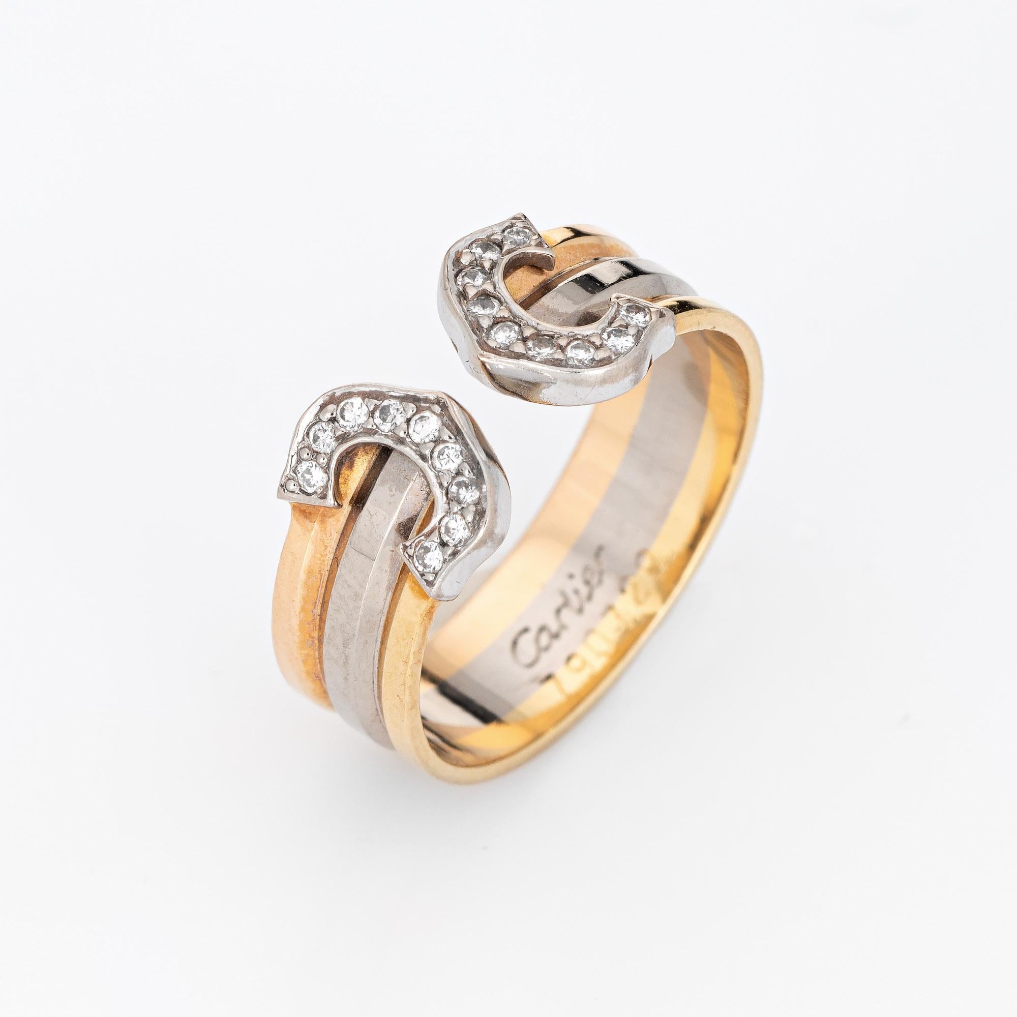 Vintage C de Cartier diamond ring crafted in 18 karat yellow, rose & white gold (circa 1991).  

18 round brilliant cut diamonds total an estimated 0.18 carats (estimated at G-H color and VS1-2 clarity).

The out of production Cartier ring features