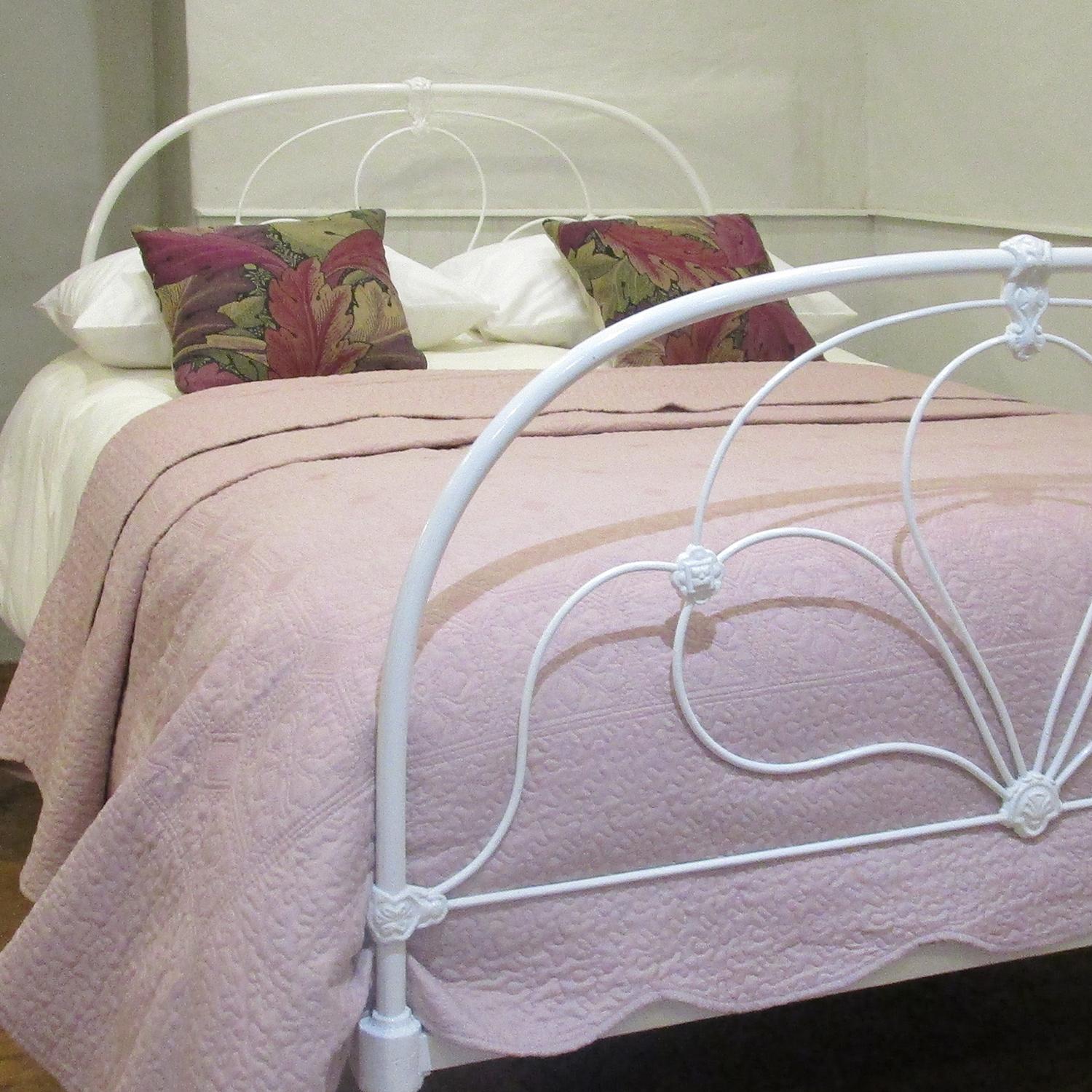 Cast iron antique bed, finished in white with simple hoop over design.

This bed accepts a double size 4ft 6in wide (54 inch or 135cm) base and mattress. 

The price includes a FIRM standard bed base to support the mattress.

The mattress,