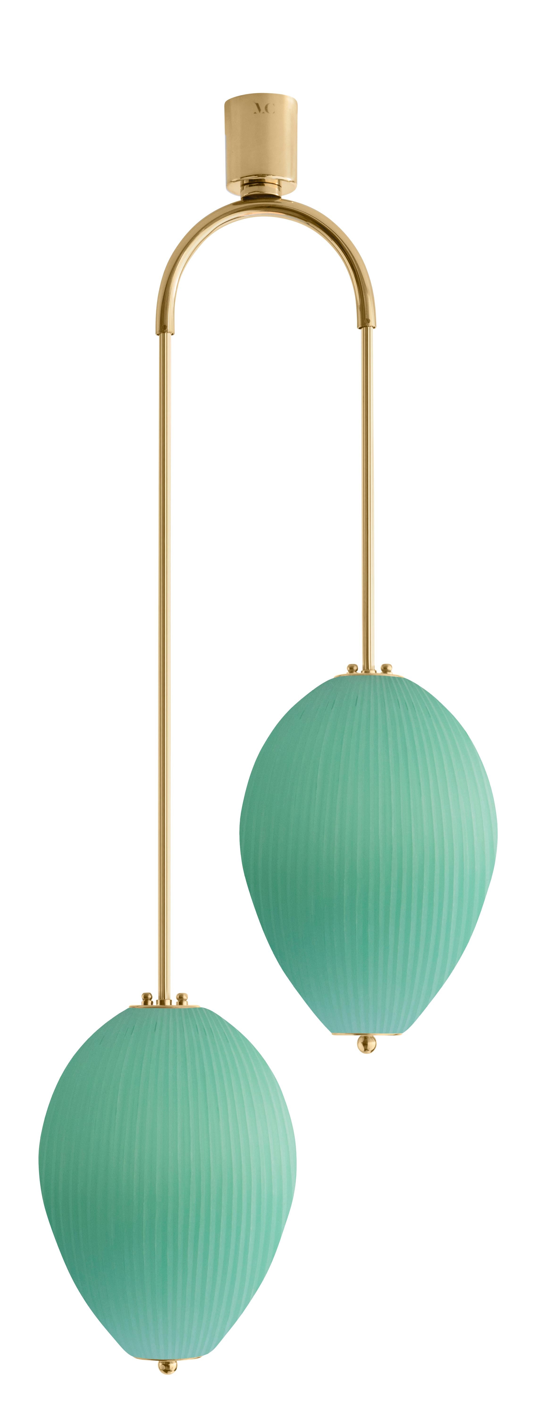 Double chandelier China 10 by Magic Circus Editions
Dimensions: H 121.5 x W 44.3 x D 25.2 cm
Materials: Brass, mouth blown glass sculpted with a diamond saw
Colour: jade green

Available finishes: Brass, nickel
Available colours: enamel soft