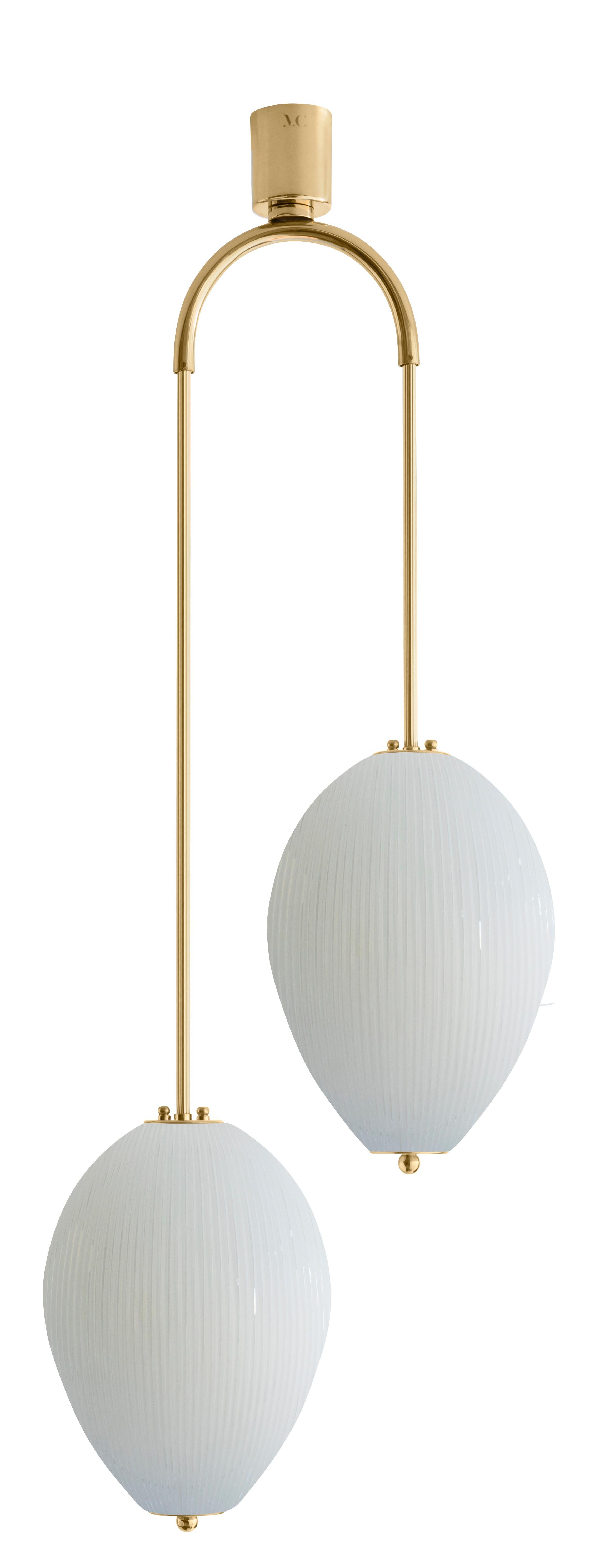 Double chandelier China 10 by Magic Circus Editions
Dimensions: H 121.5 x W 44.3 x D 25.2 cm
Materials: Brass, mouth blown glass sculpted with a diamond saw
Colour: rich grey

Available finishes: Brass, nickel
Available colours: enamel soft